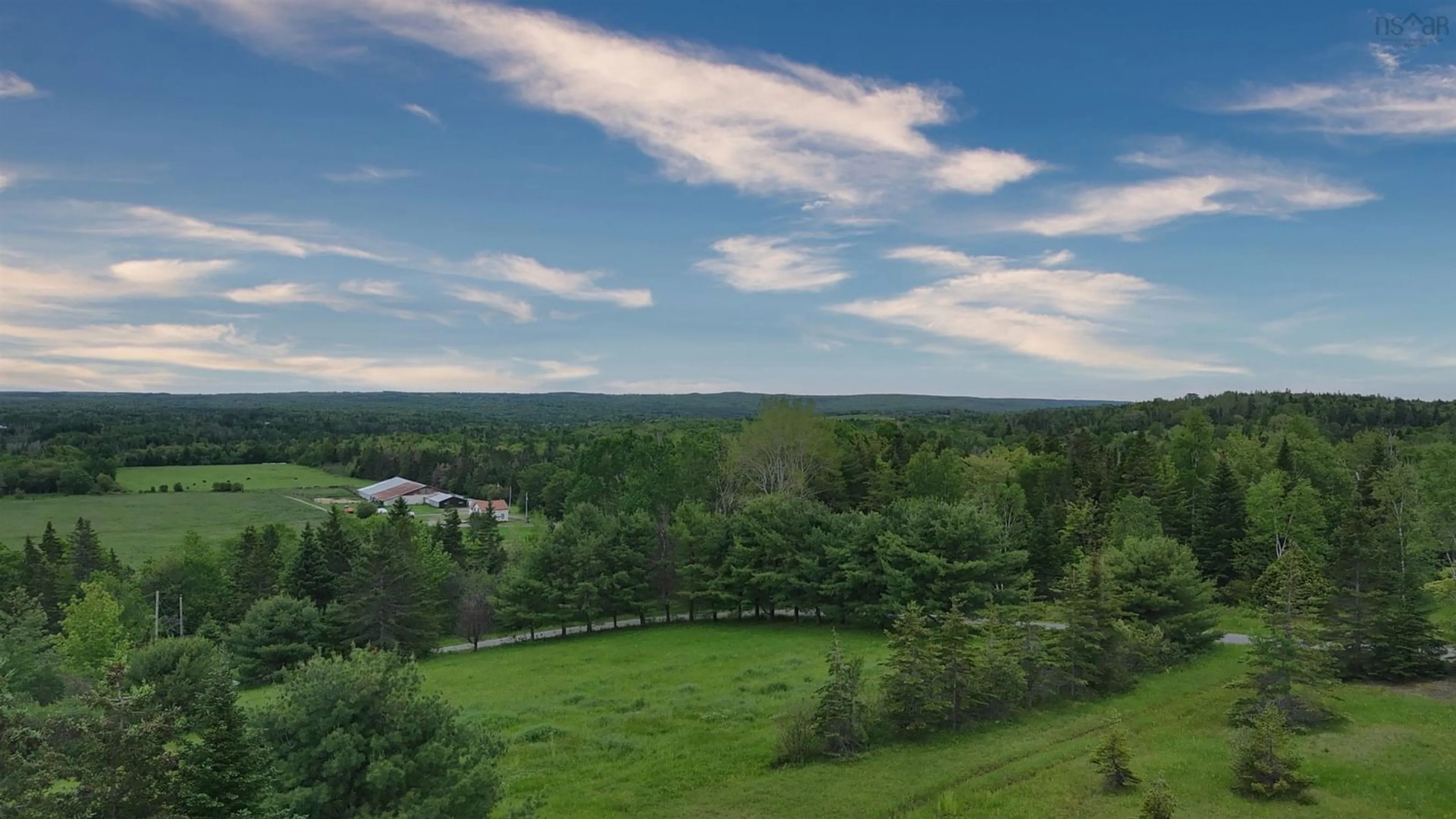 A pic from outside/outdoor area/front of a property/back of a property/a pic from drone, forest/trees view for 2420 Coxheath Rd, Blacketts Lake Nova Scotia B1L 1A5