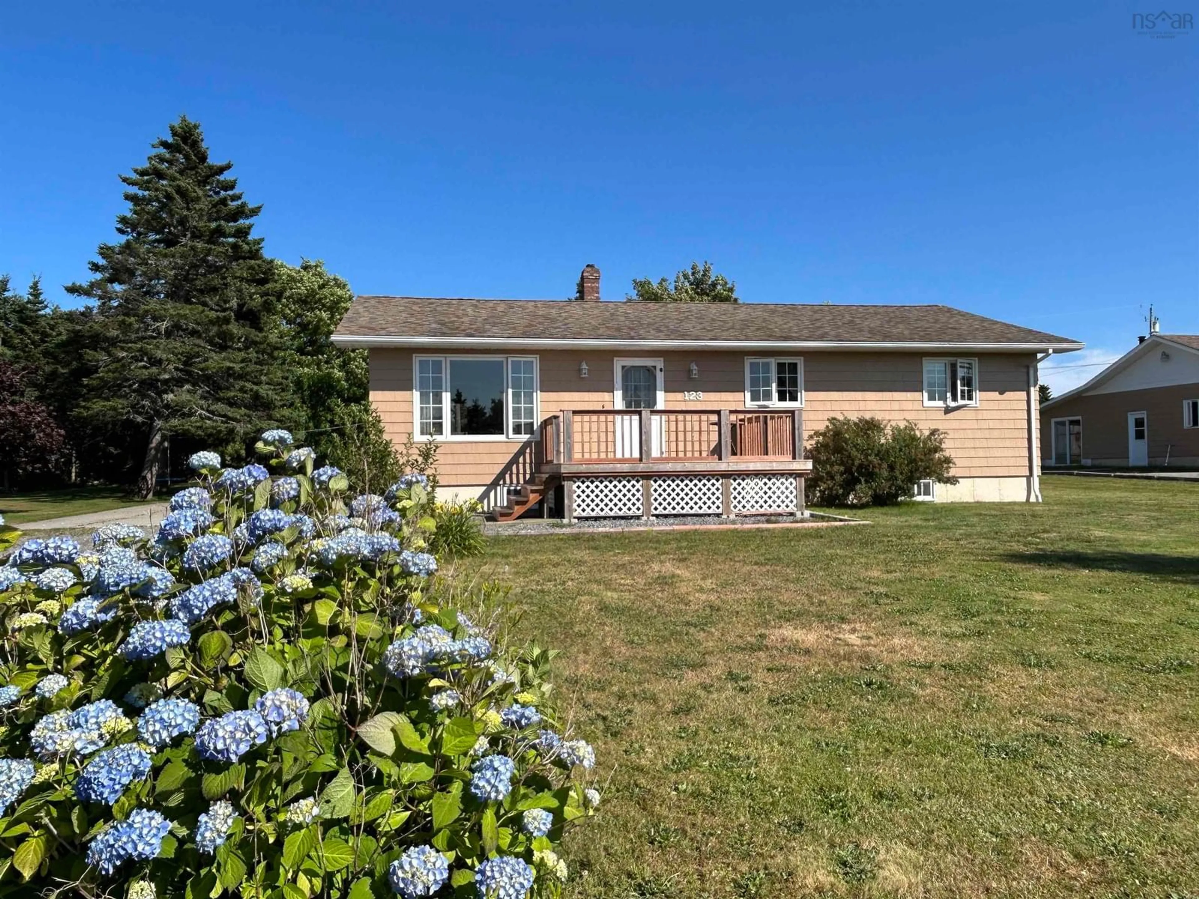 A pic from outside/outdoor area/front of a property/back of a property/a pic from drone, water/lake/river/ocean view for 123 Mcgray Avenue, North East Point Nova Scotia B0W 2P0