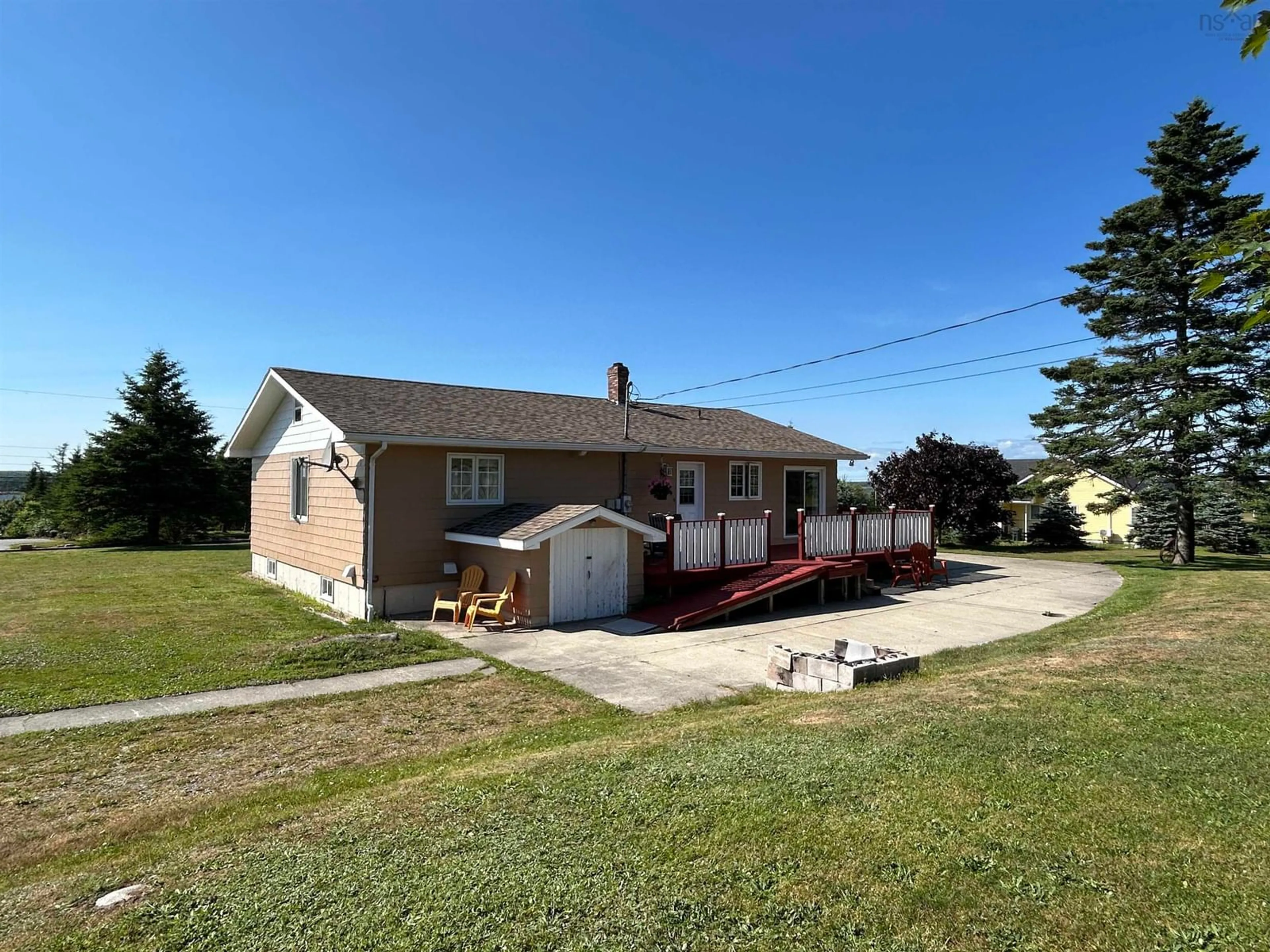 A pic from outside/outdoor area/front of a property/back of a property/a pic from drone, unknown for 123 Mcgray Avenue, North East Point Nova Scotia B0W 2P0