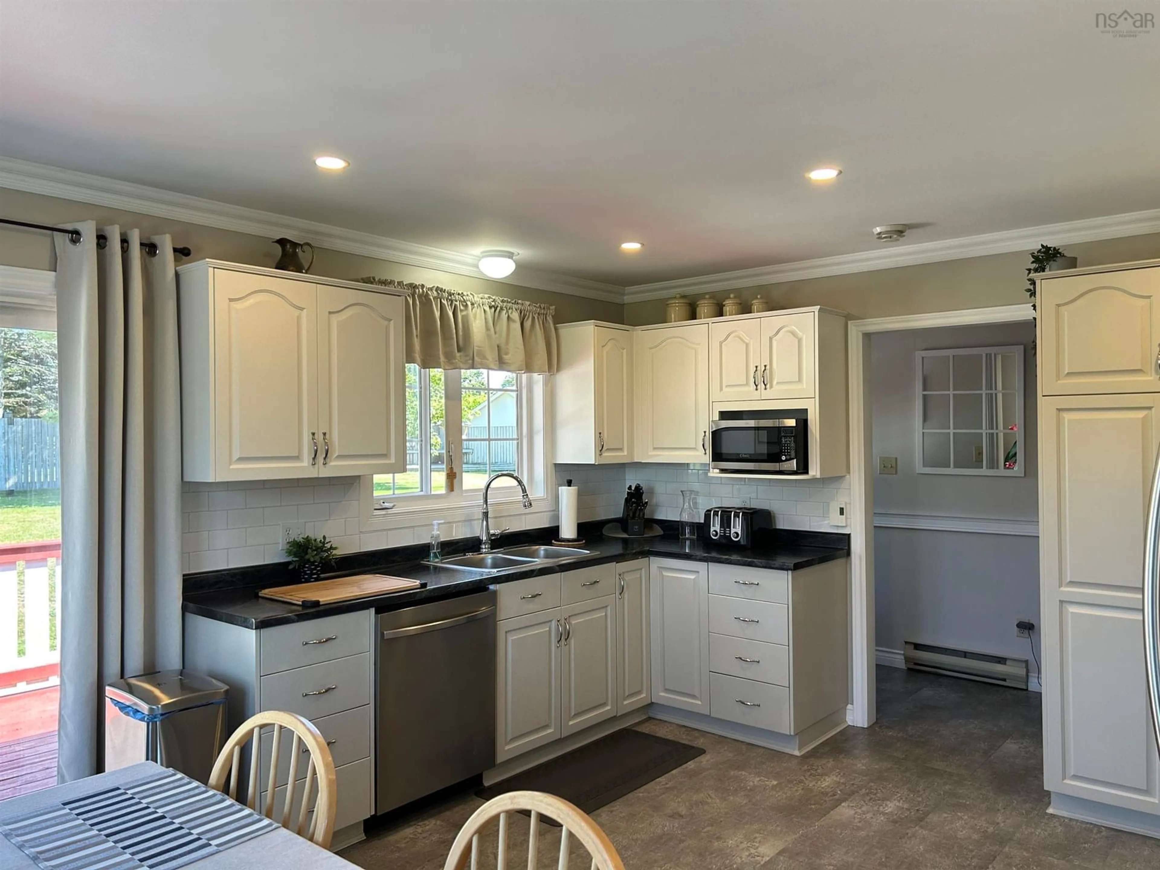 Open concept kitchen, ceramic/tile floor for 123 Mcgray Avenue, North East Point Nova Scotia B0W 2P0