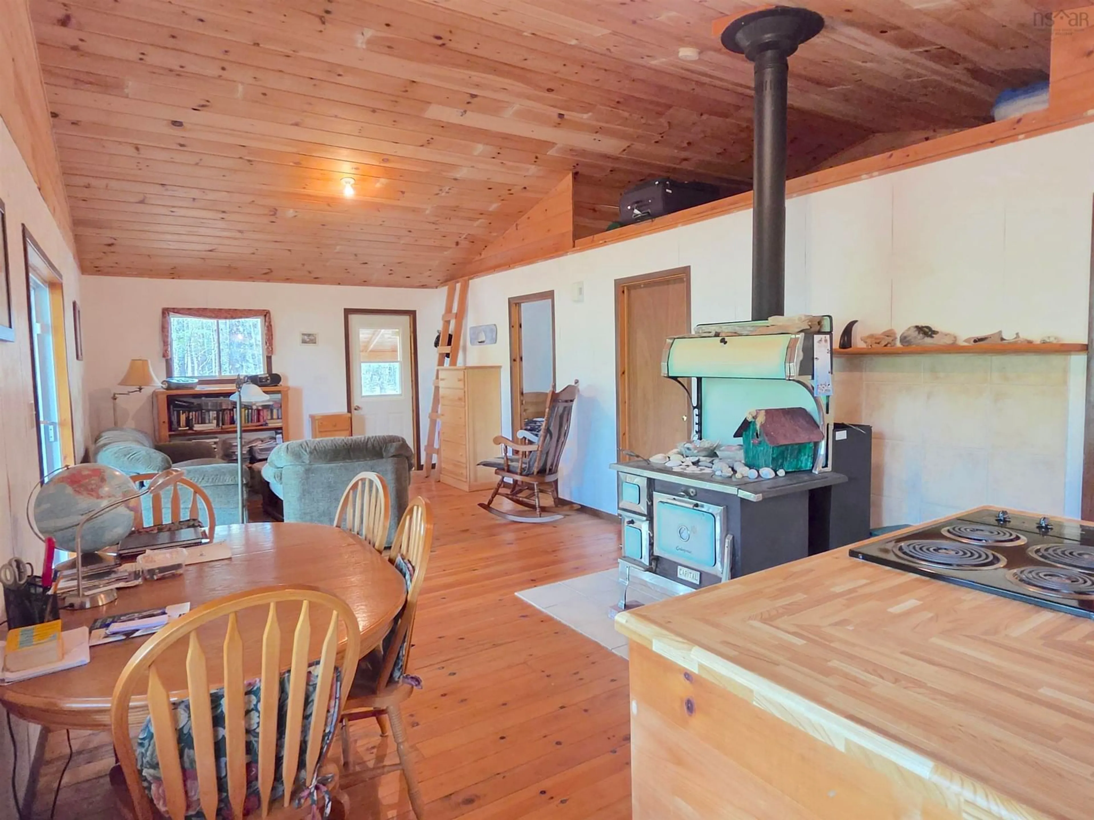 Open concept kitchen, wood/laminate floor for 90 Pipe Cove Dr, Greenfield Nova Scotia B0T 1E0