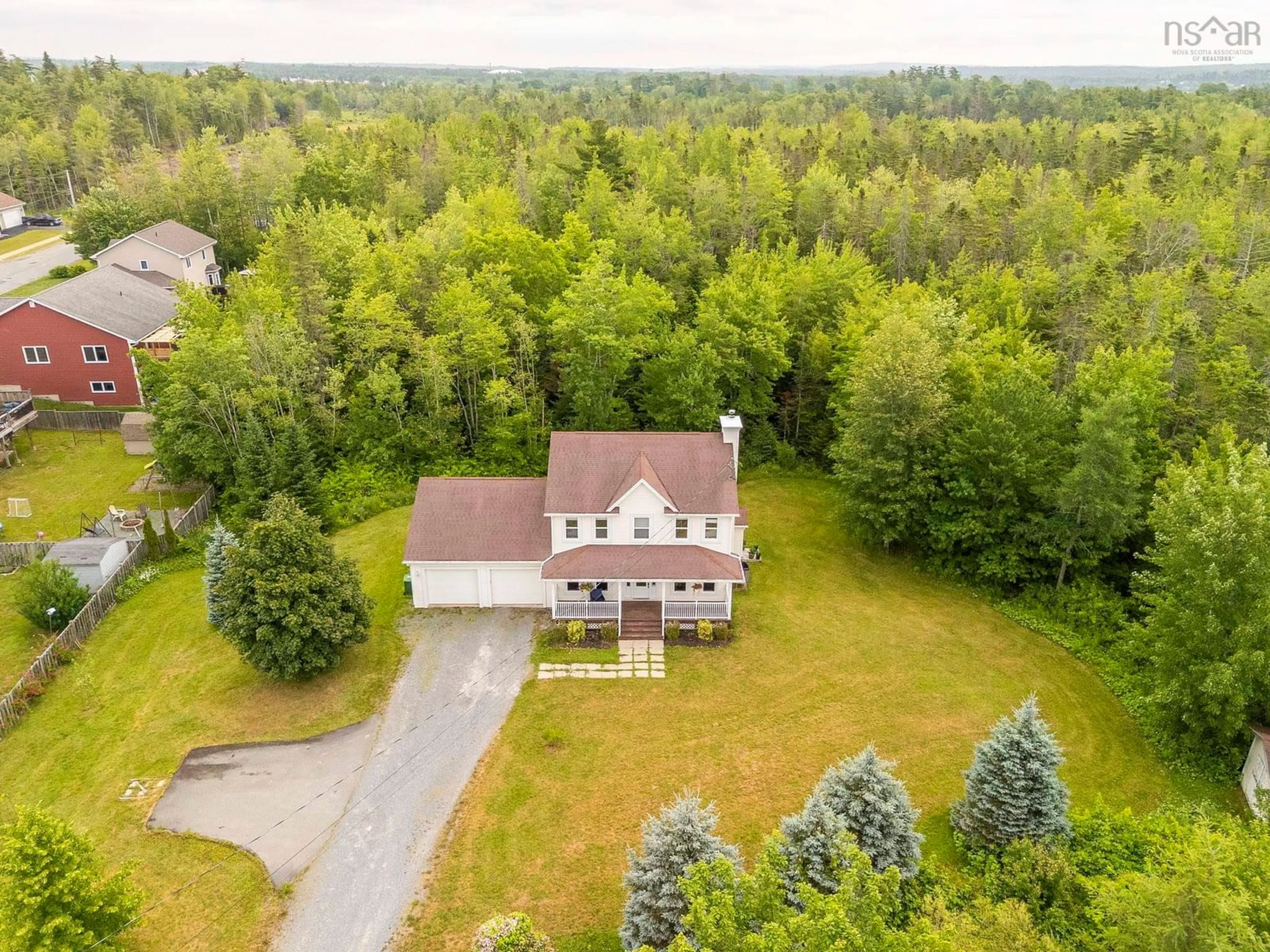 A pic from outside/outdoor area/front of a property/back of a property/a pic from drone, unknown for 72 Elmwood Dr, Elmsdale Nova Scotia B2S 0A2