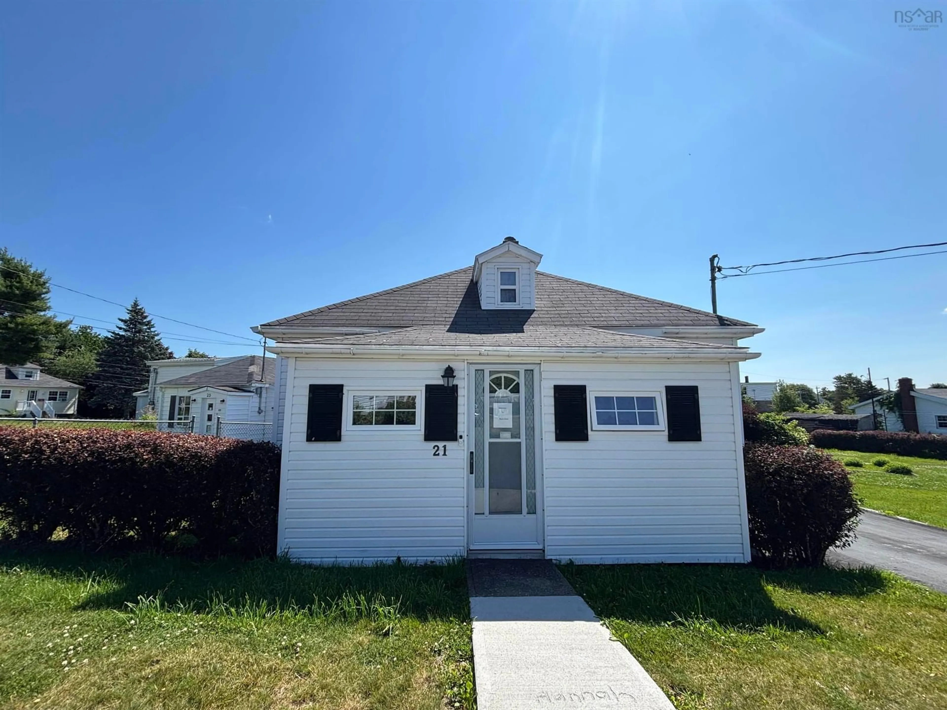 Home with vinyl exterior material, street for 21 Clifford St., North Sydney Nova Scotia B2A 1X2