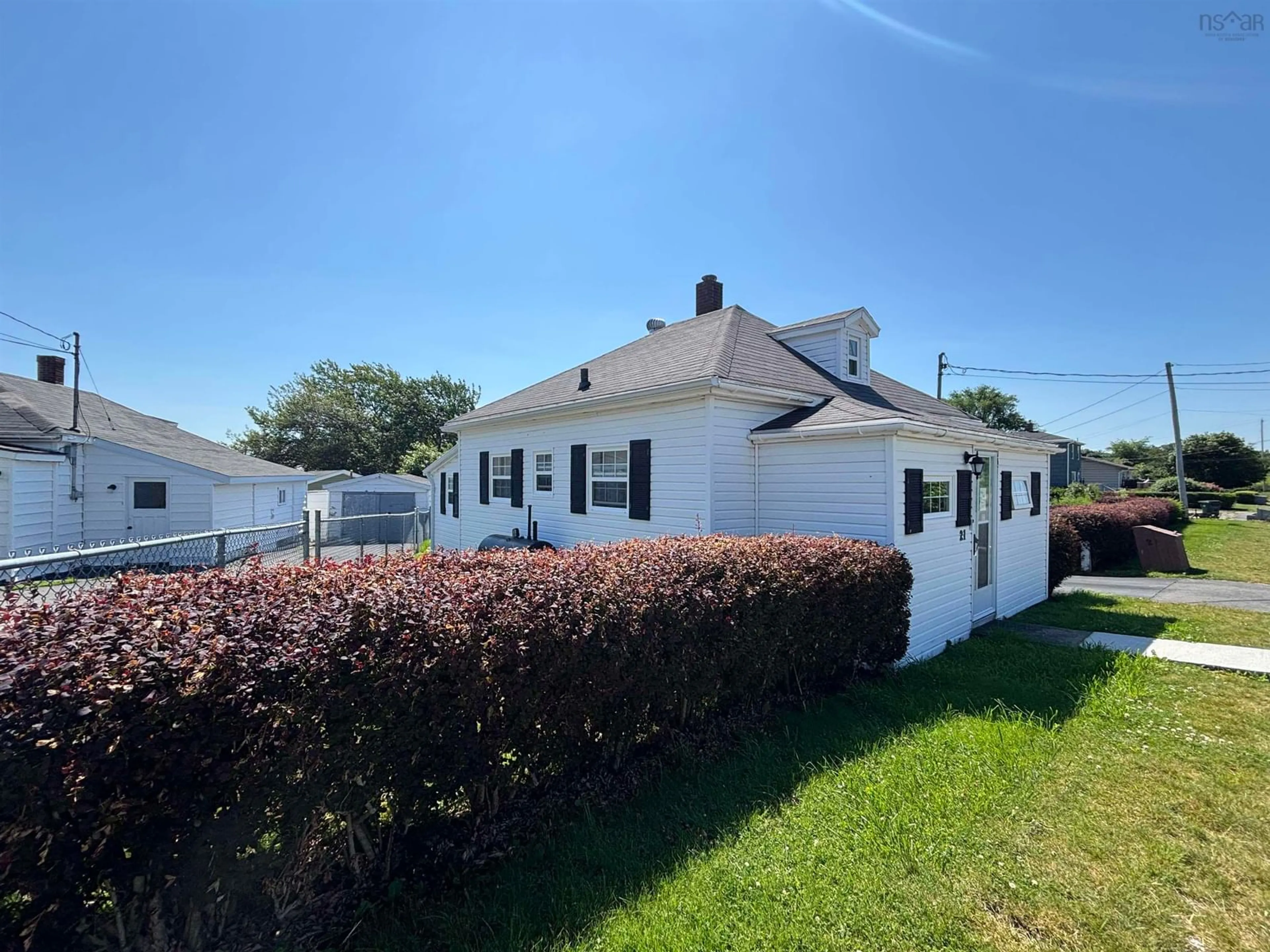 Home with vinyl exterior material, street for 21 Clifford St., North Sydney Nova Scotia B2A 1X2