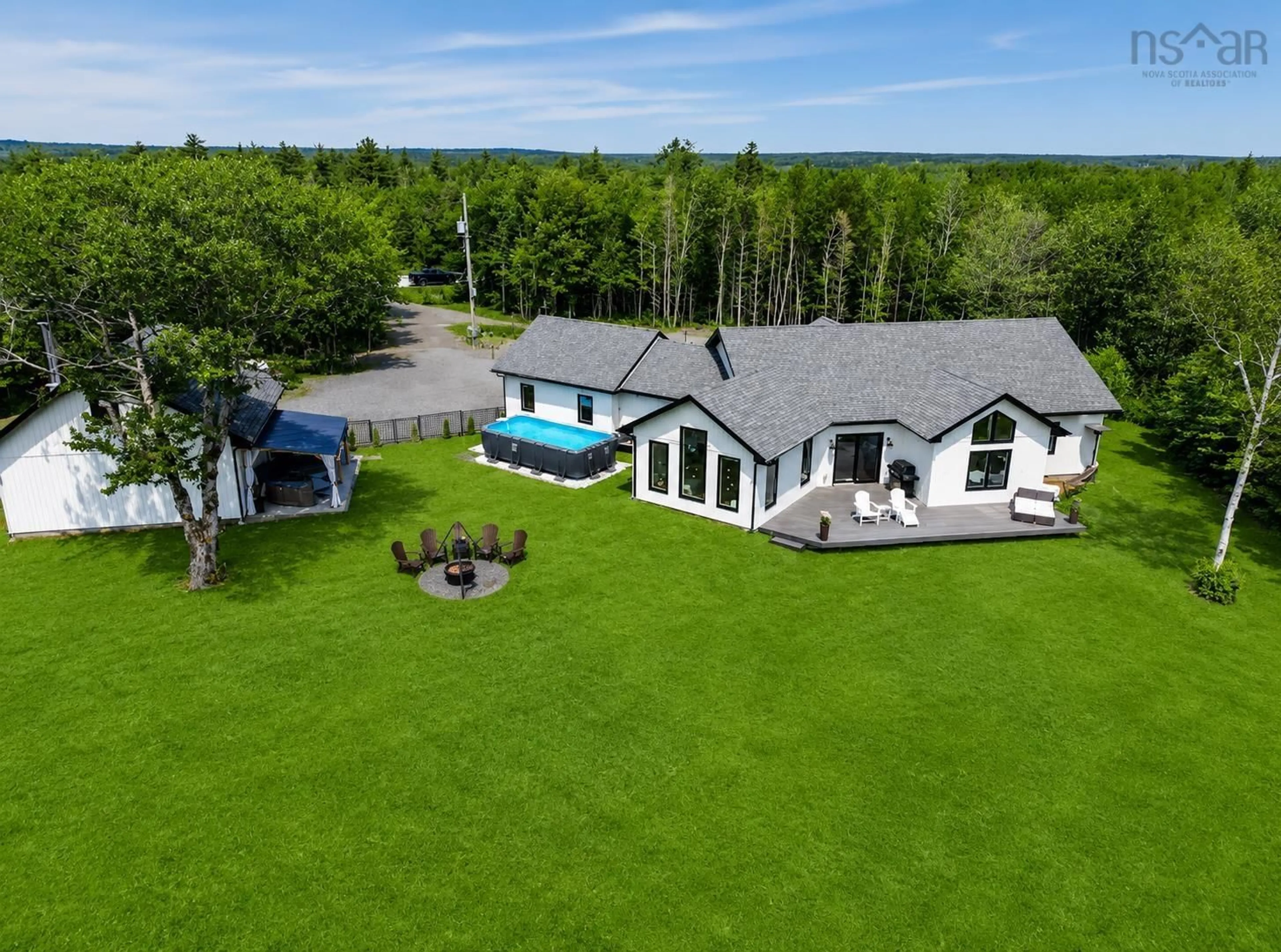 A pic from outside/outdoor area/front of a property/back of a property/a pic from drone, water/lake/river/ocean view for 188 Sheiling Dr, Marion Bridge Nova Scotia B1K 0B3