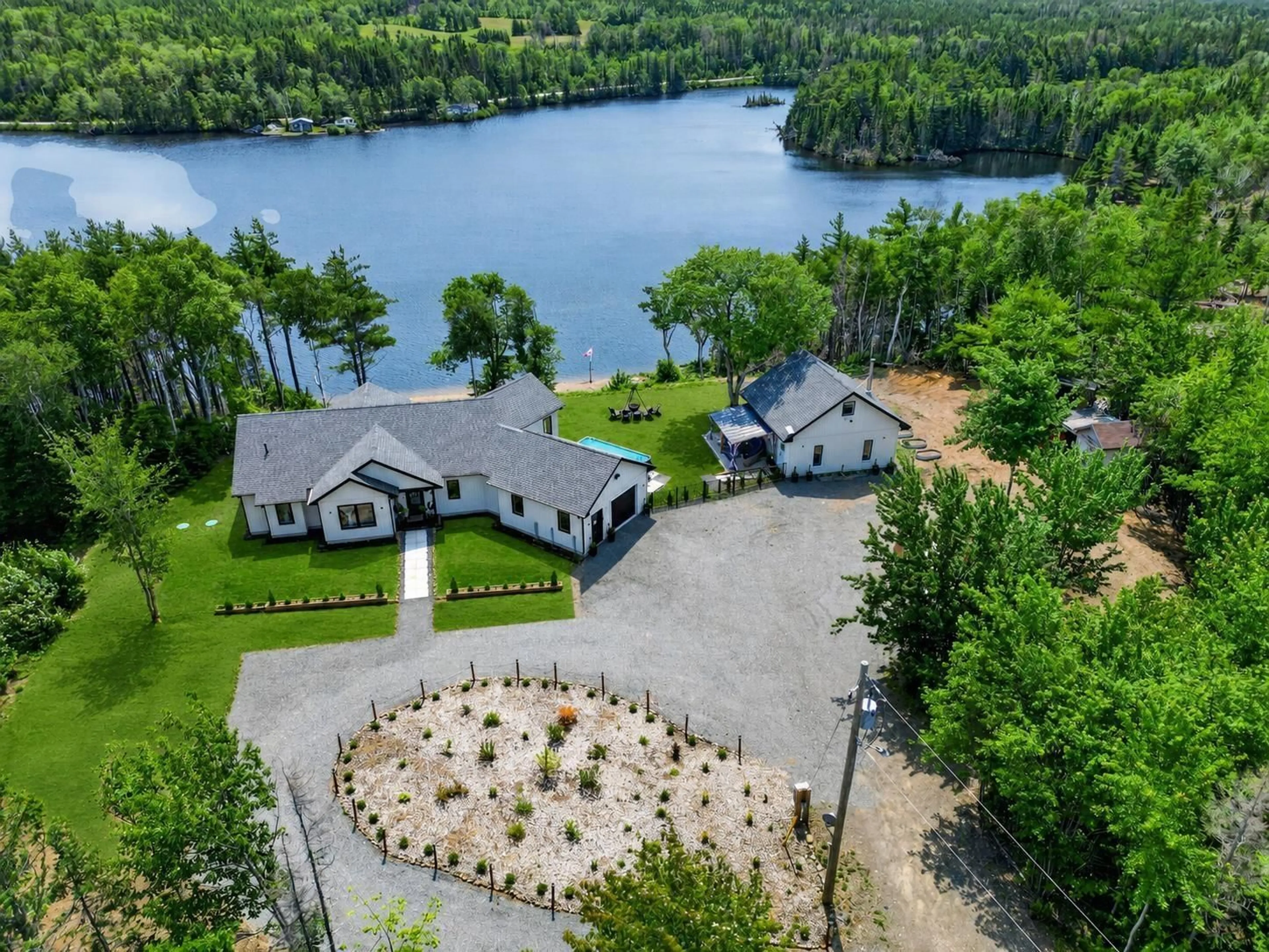 A pic from outside/outdoor area/front of a property/back of a property/a pic from drone, water/lake/river/ocean view for 188 Sheiling Dr, Marion Bridge Nova Scotia B1K 0B3