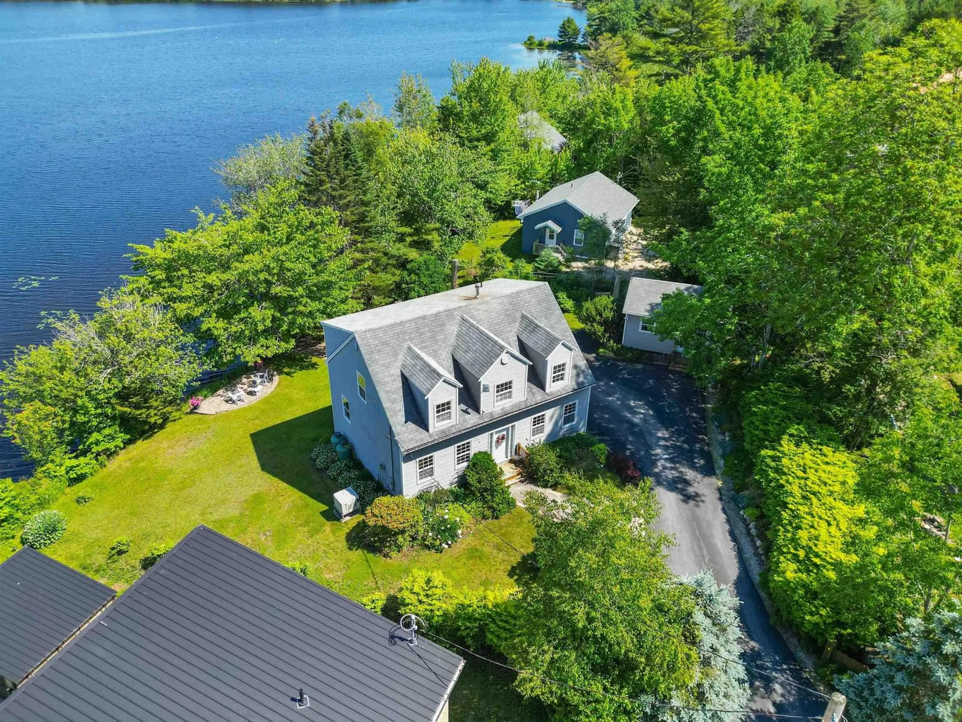 A pic from outside/outdoor area/front of a property/back of a property/a pic from drone, water/lake/river/ocean view for 6 Stanford Lake Rd, Chester Nova Scotia B0J 1J0