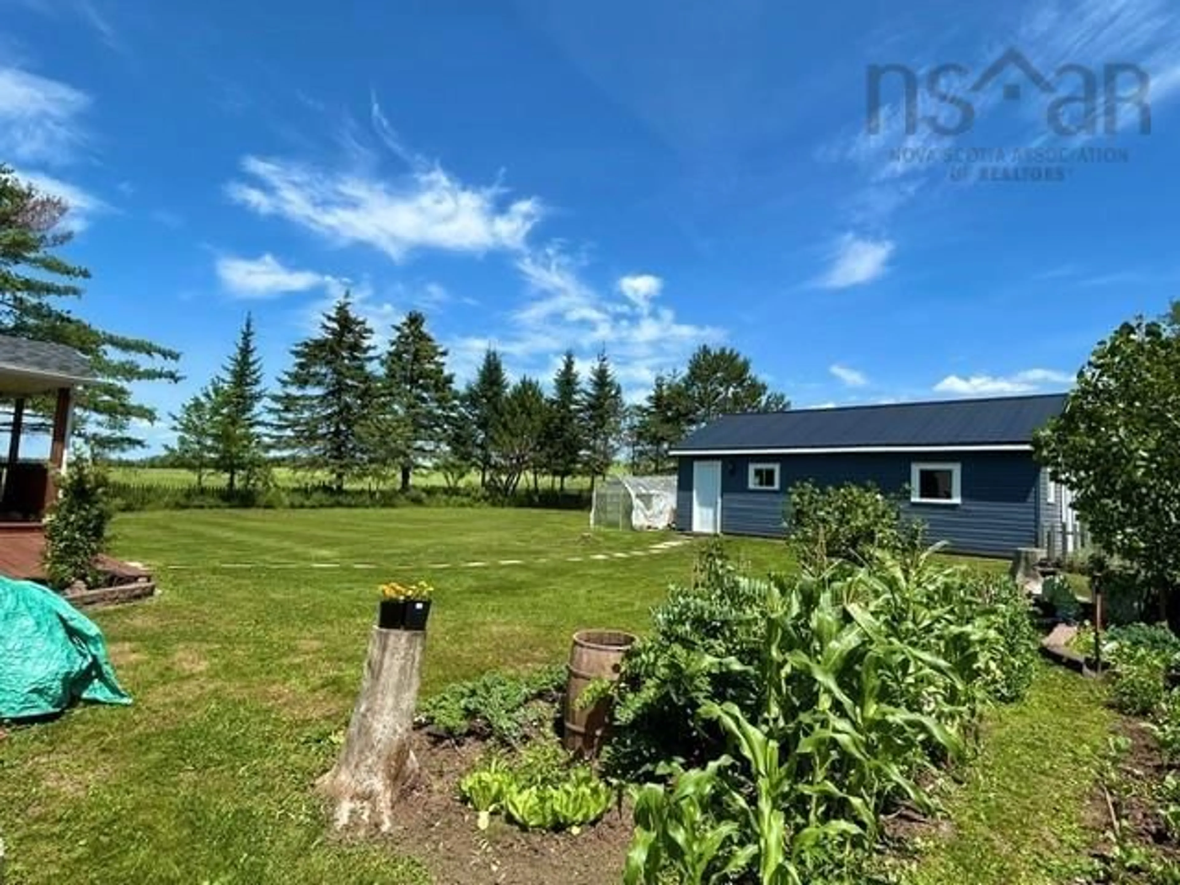 A pic from outside/outdoor area/front of a property/back of a property/a pic from drone, water/lake/river/ocean view for 197 Highway 2, Brookfield Nova Scotia B0N 1C0