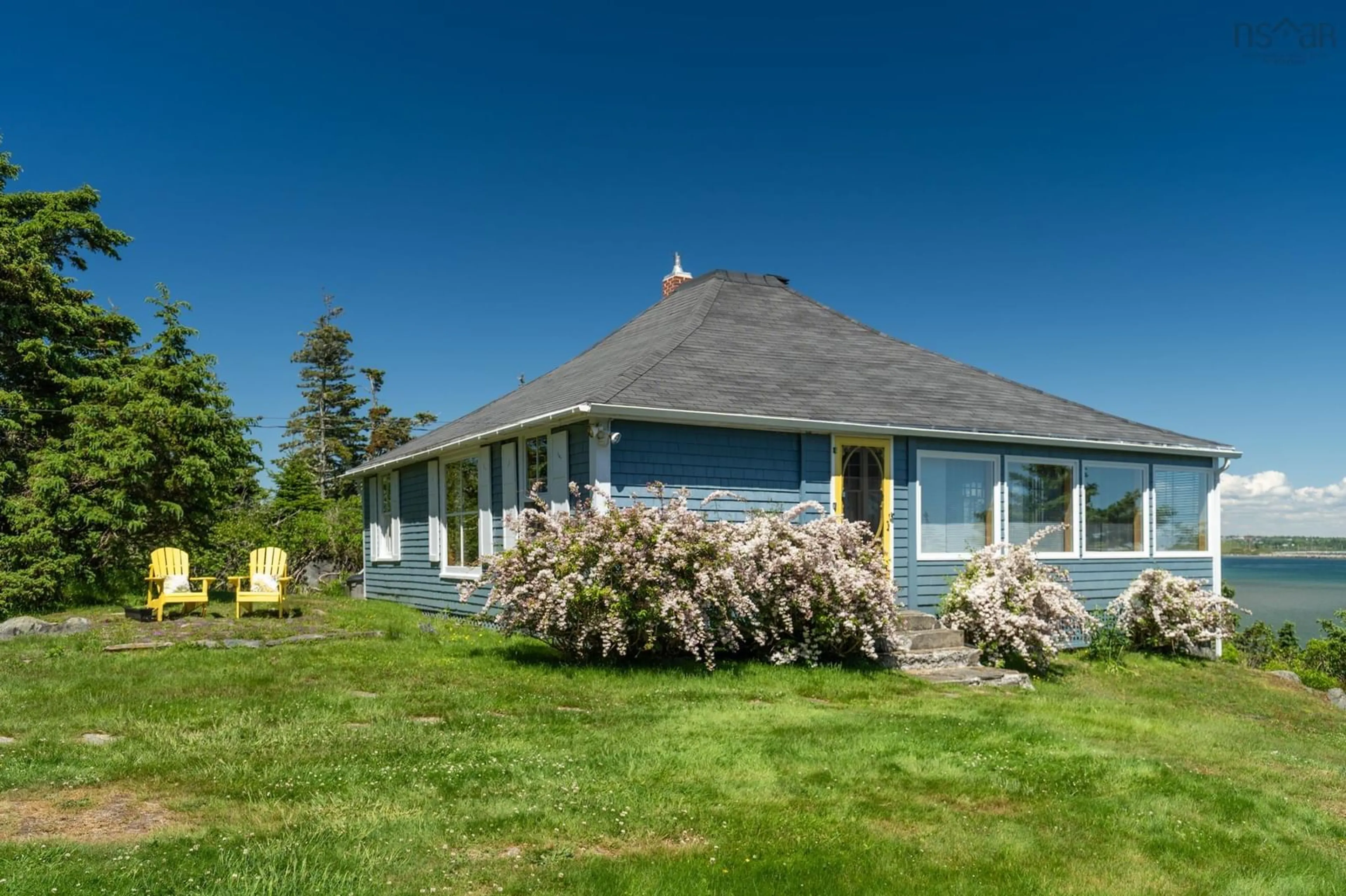 A pic from outside/outdoor area/front of a property/back of a property/a pic from drone, water/lake/river/ocean view for 1393 Highway 304, Cape Forchu Nova Scotia B5A 5G7