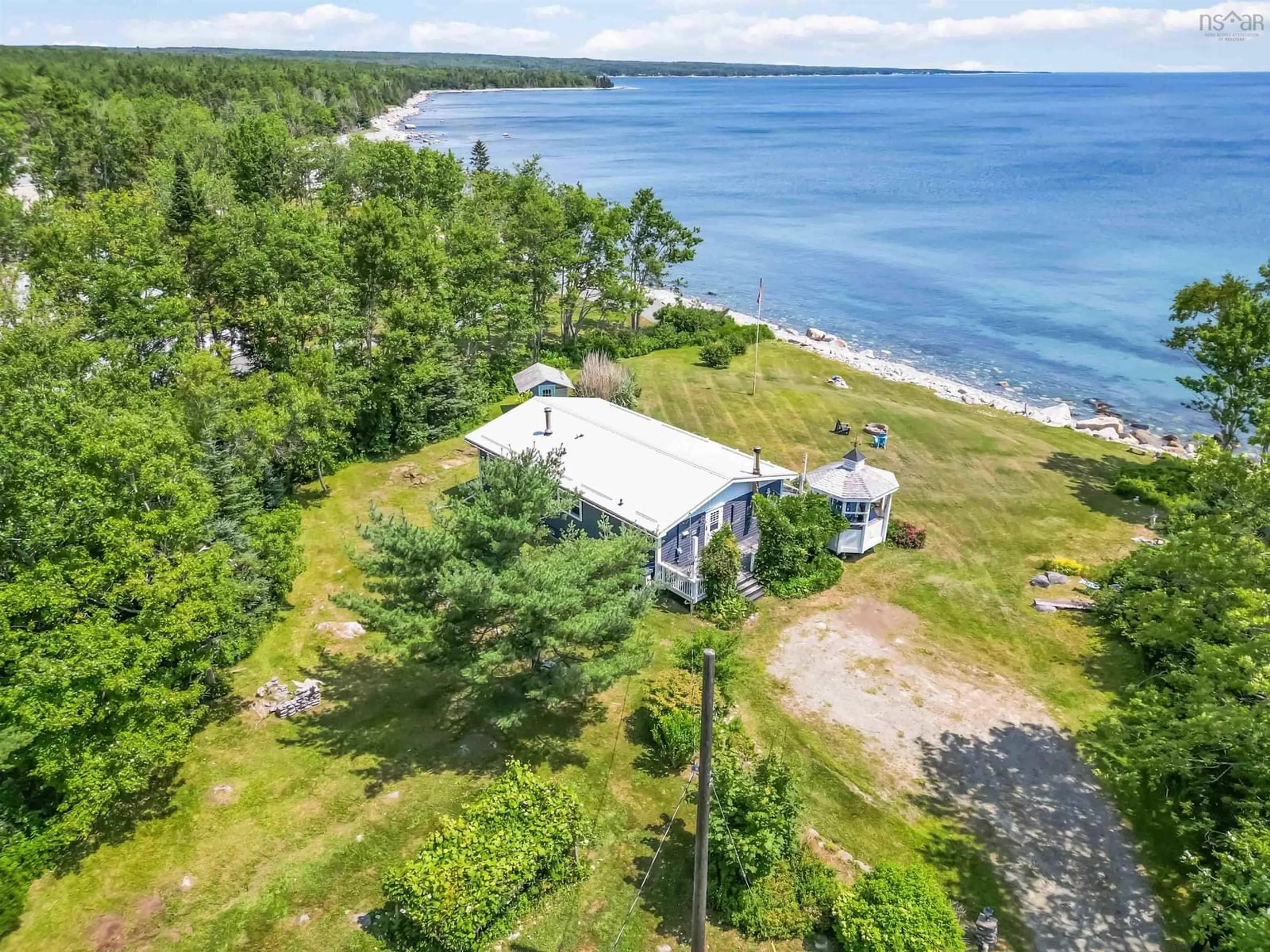 A pic from outside/outdoor area/front of a property/back of a property/a pic from drone, water/lake/river/ocean view for 258 Bells Point Rd, Port Mouton Nova Scotia B0T 1T0