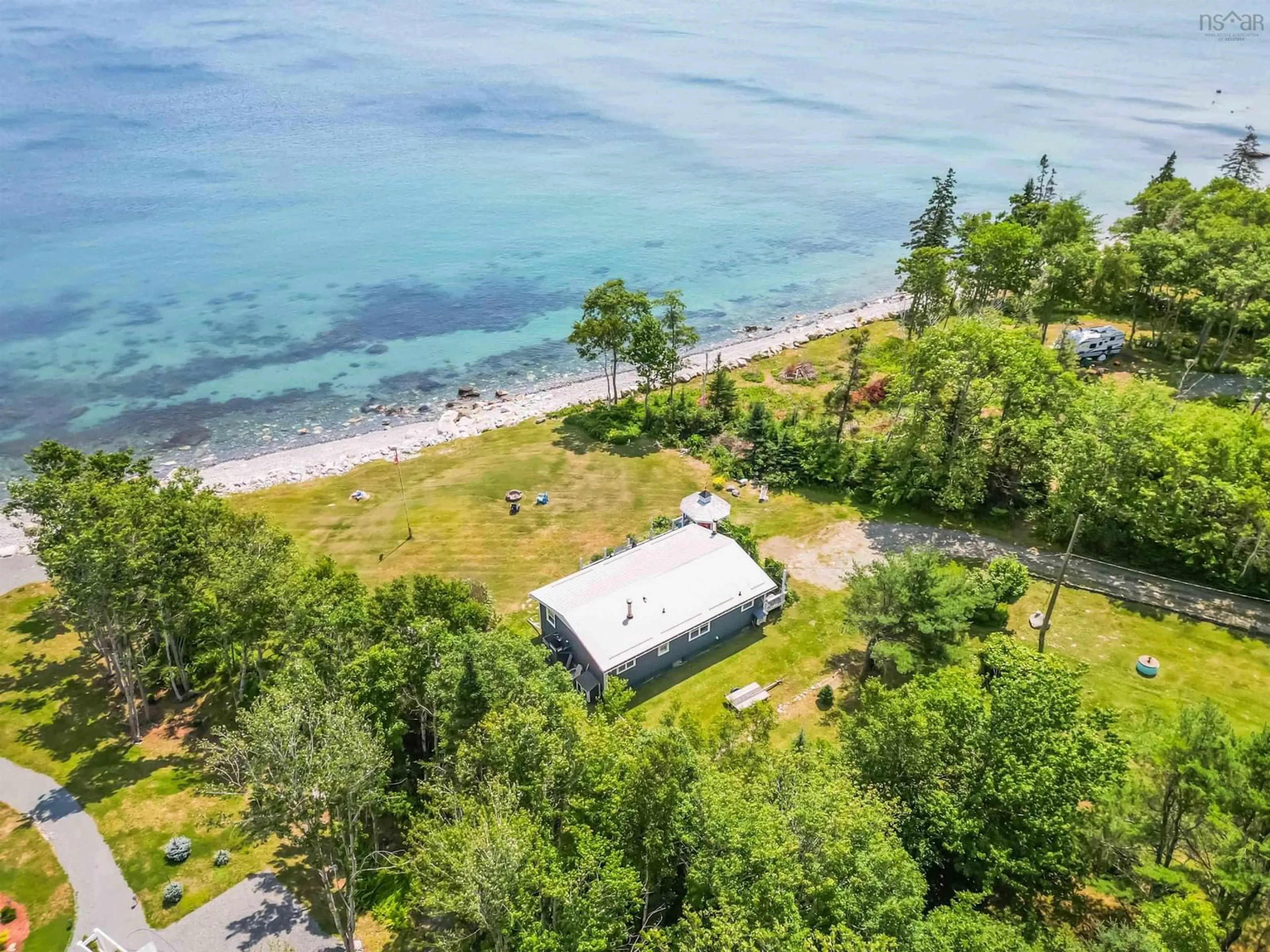 A pic from outside/outdoor area/front of a property/back of a property/a pic from drone, water/lake/river/ocean view for 258 Bells Point Rd, Port Mouton Nova Scotia B0T 1T0