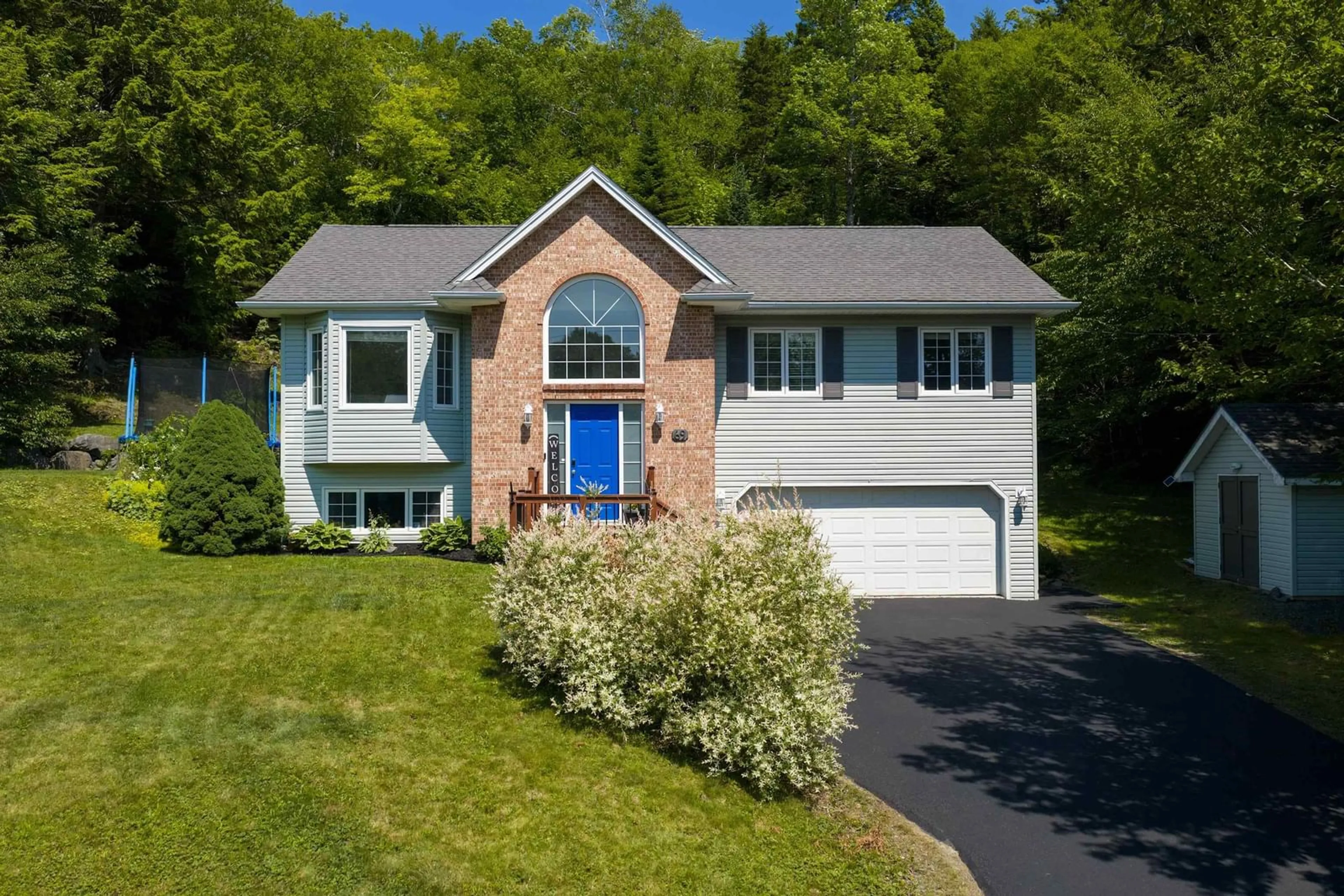 Home with vinyl exterior material, street for 69 Lylewood Dr, Middle Sackville Nova Scotia B4E 3B1