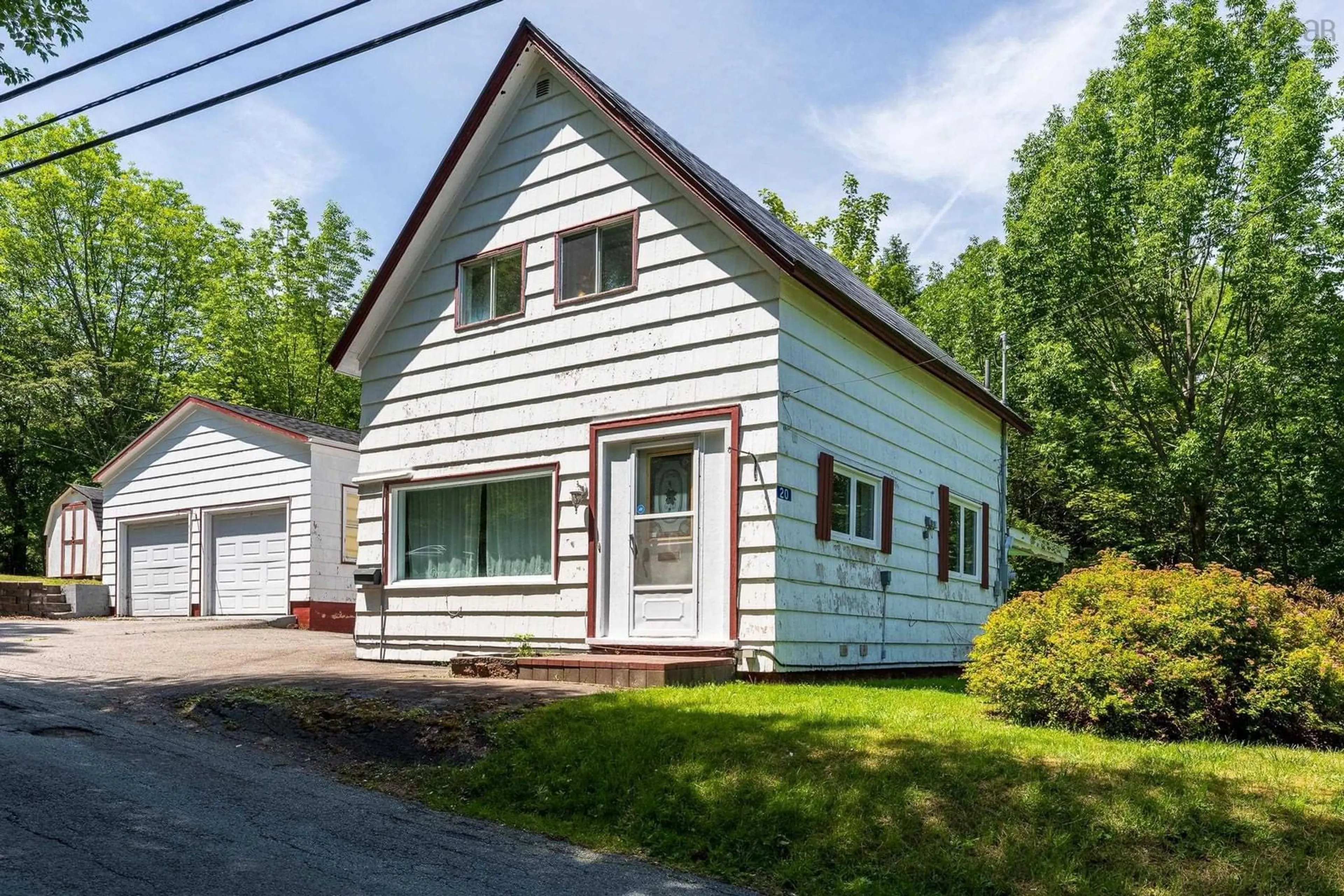 Home with vinyl exterior material, street for 20 Pine St, Bridgewater Nova Scotia B4V 1X5
