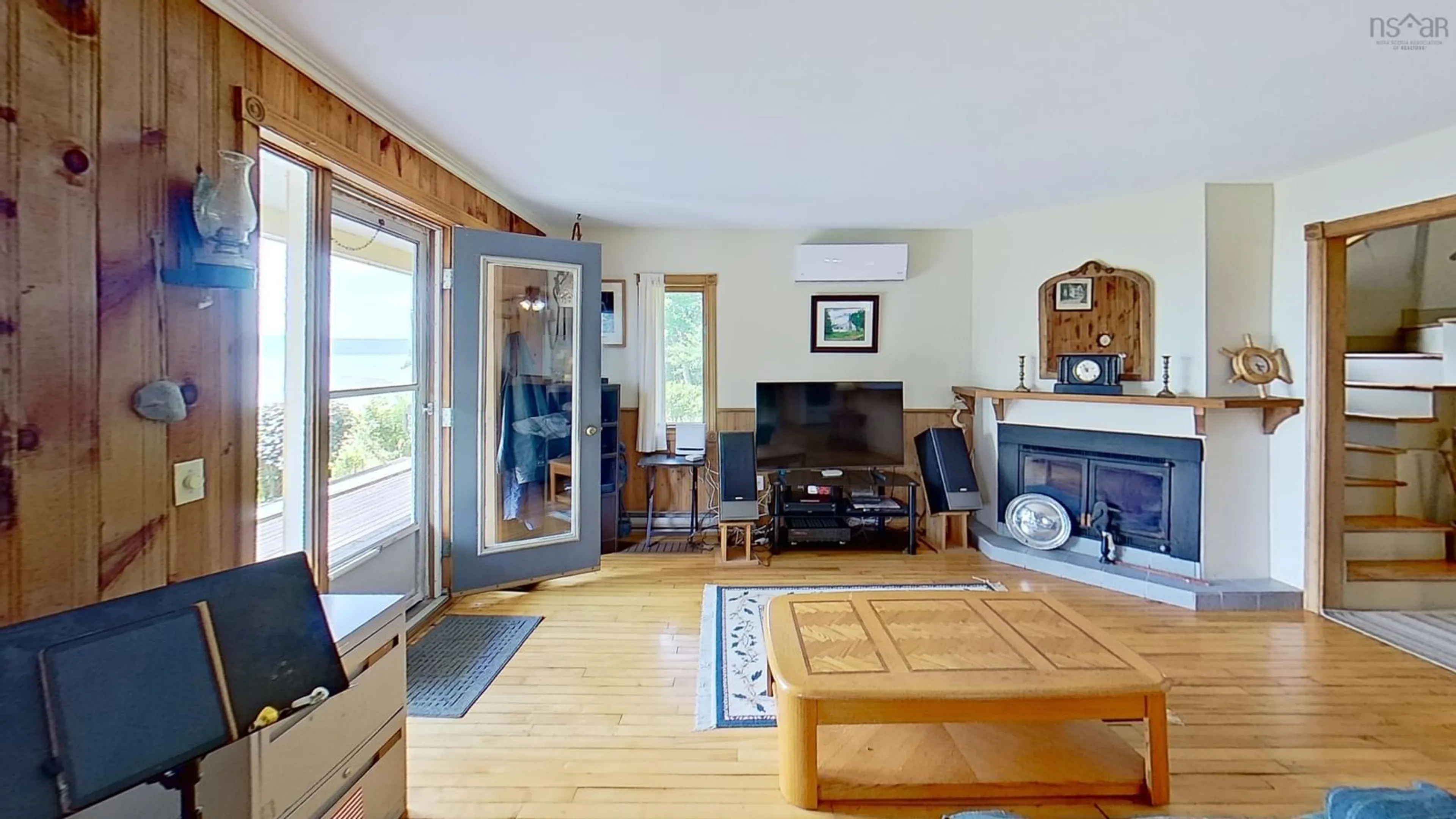 Living room with furniture, wood/laminate floor for 8965 Ns-101, Brighton Nova Scotia B0V 1A0
