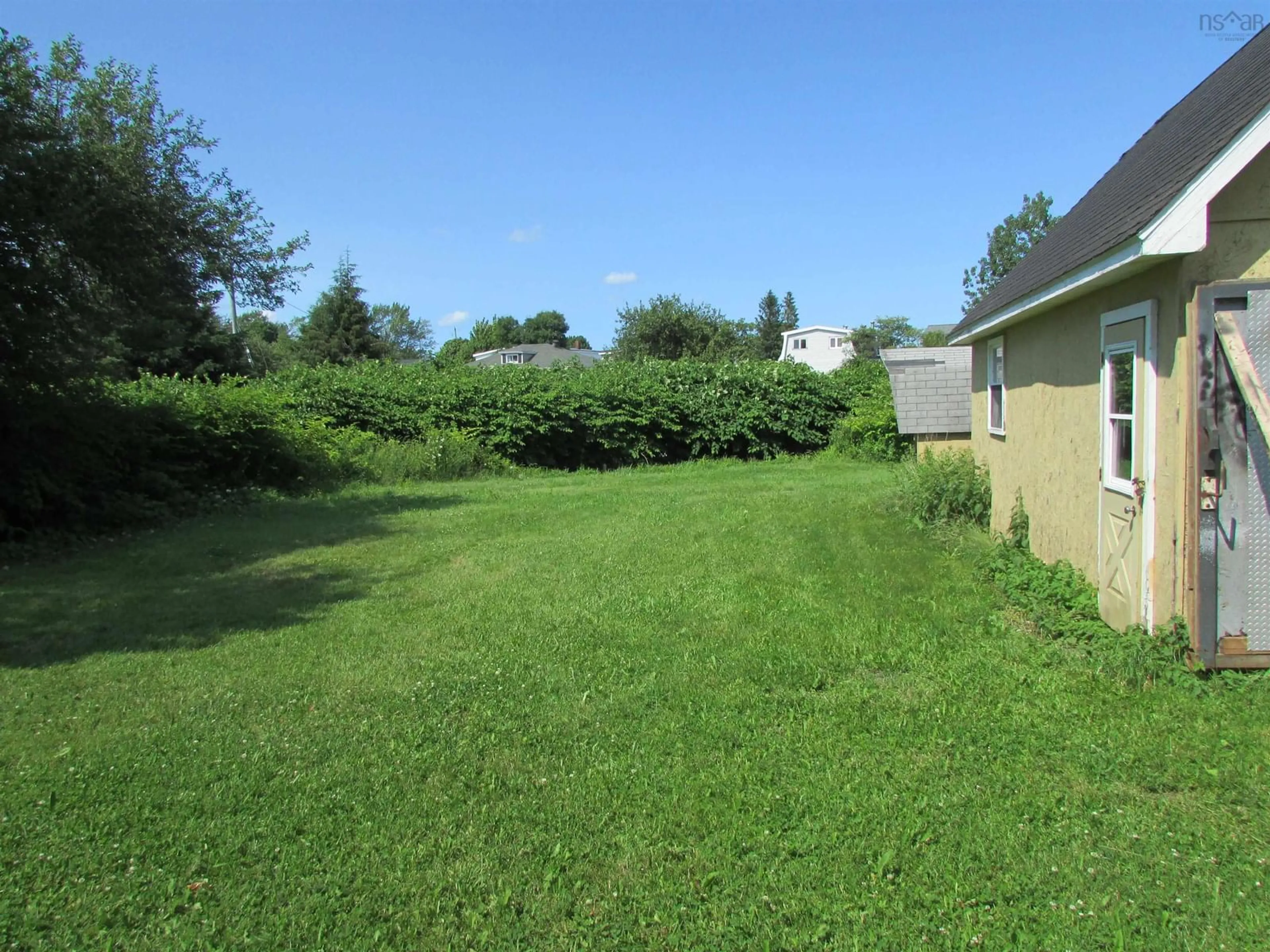 A pic from outside/outdoor area/front of a property/back of a property/a pic from drone, unknown for 35 Regent St, North Sydney Nova Scotia B2A 2E7