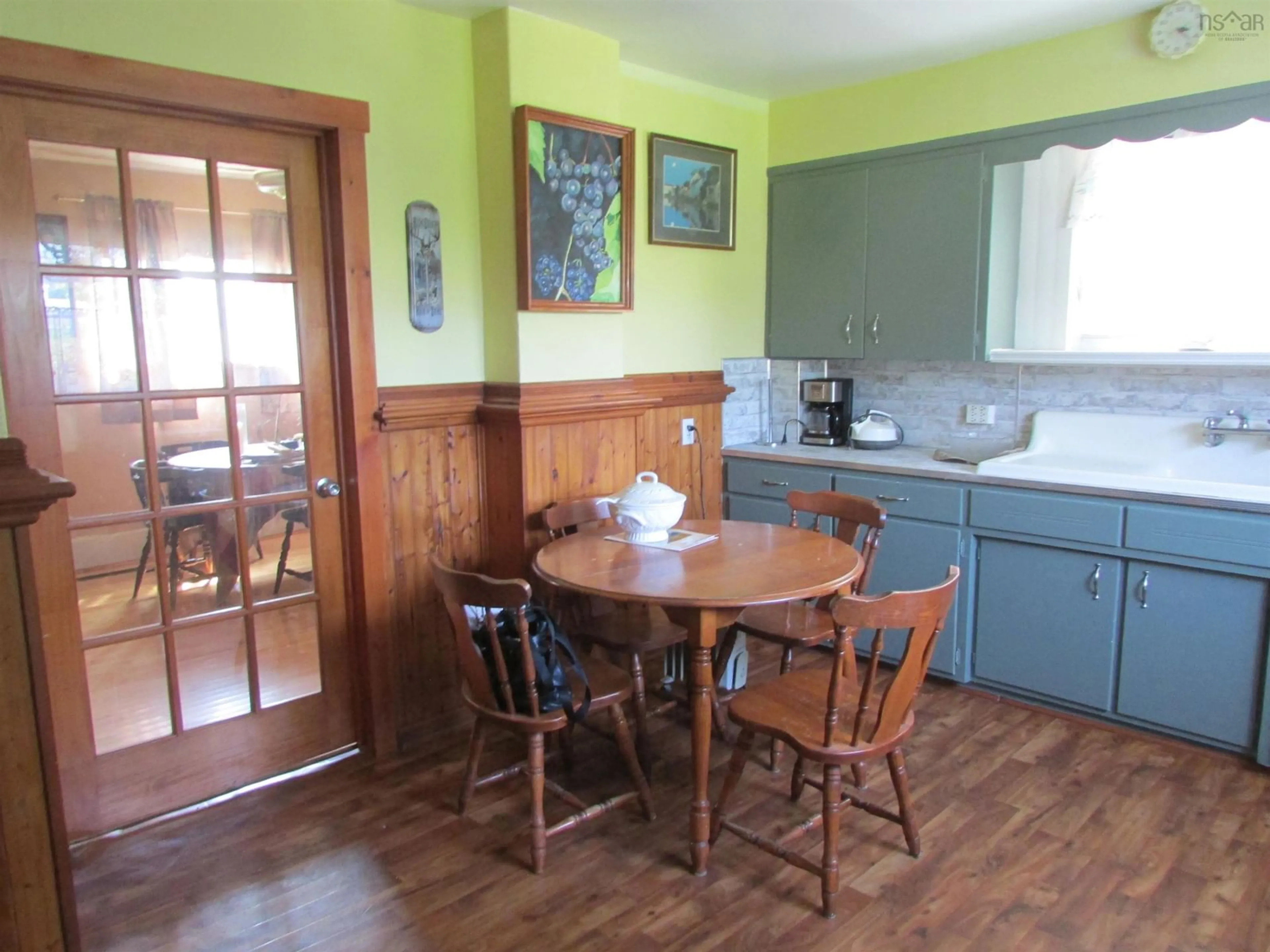 Dining room, wood/laminate floor for 35 Regent St, North Sydney Nova Scotia B2A 2E7