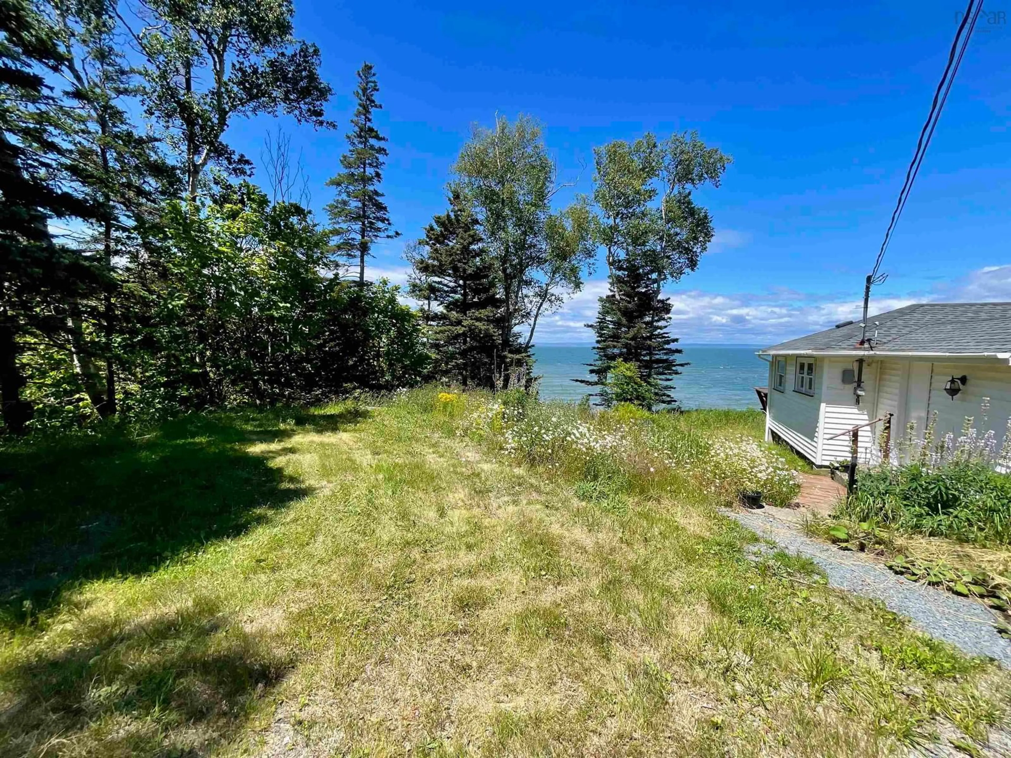 A pic from outside/outdoor area/front of a property/back of a property/a pic from drone, water/lake/river/ocean view for 427 Old Baxter Mill Rd, Baxters Harbour Nova Scotia B0P 1H0