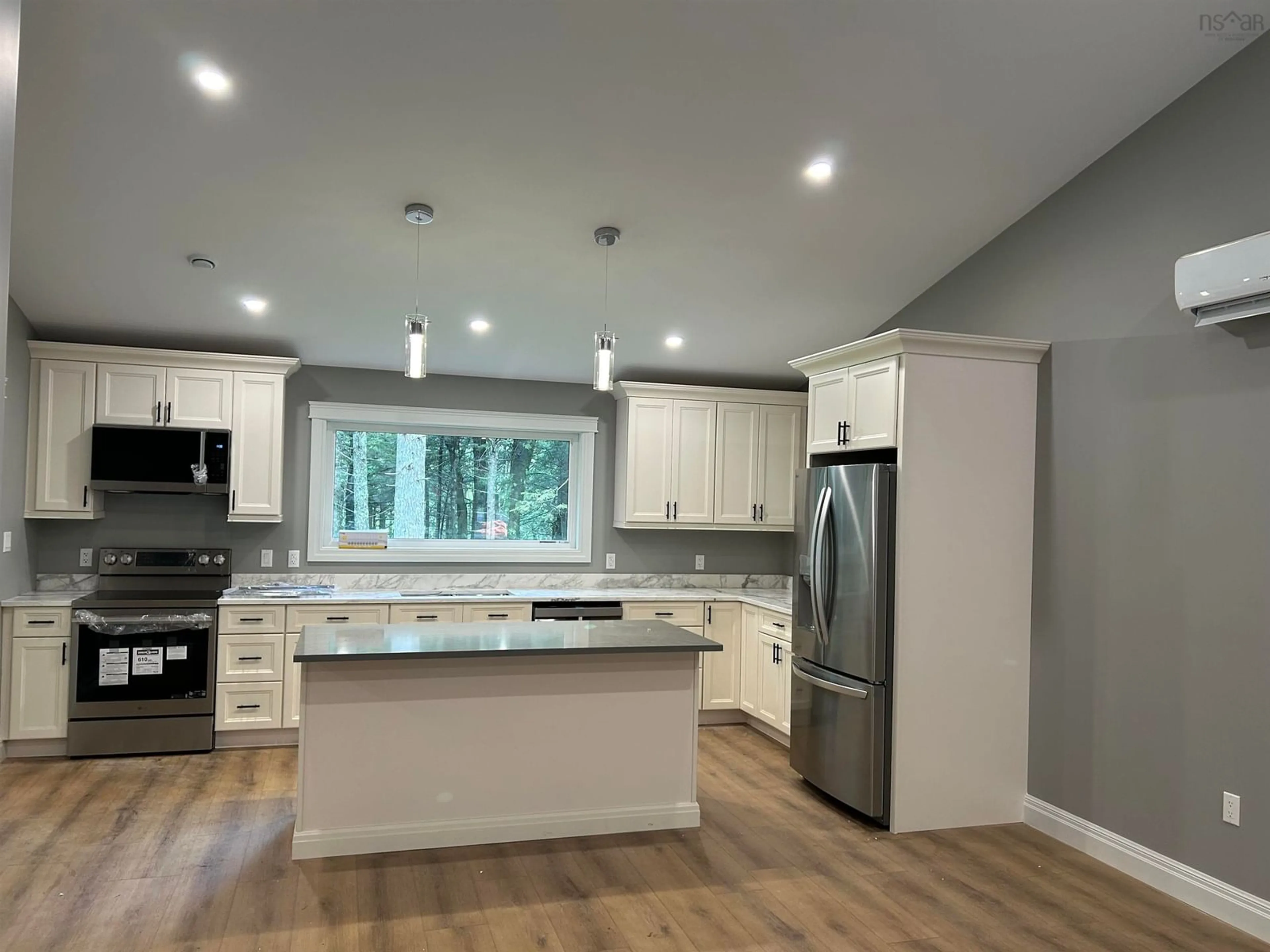 Open concept kitchen, wood/laminate floor for 2431 Highway 202, Gore Nova Scotia B0W 2N0