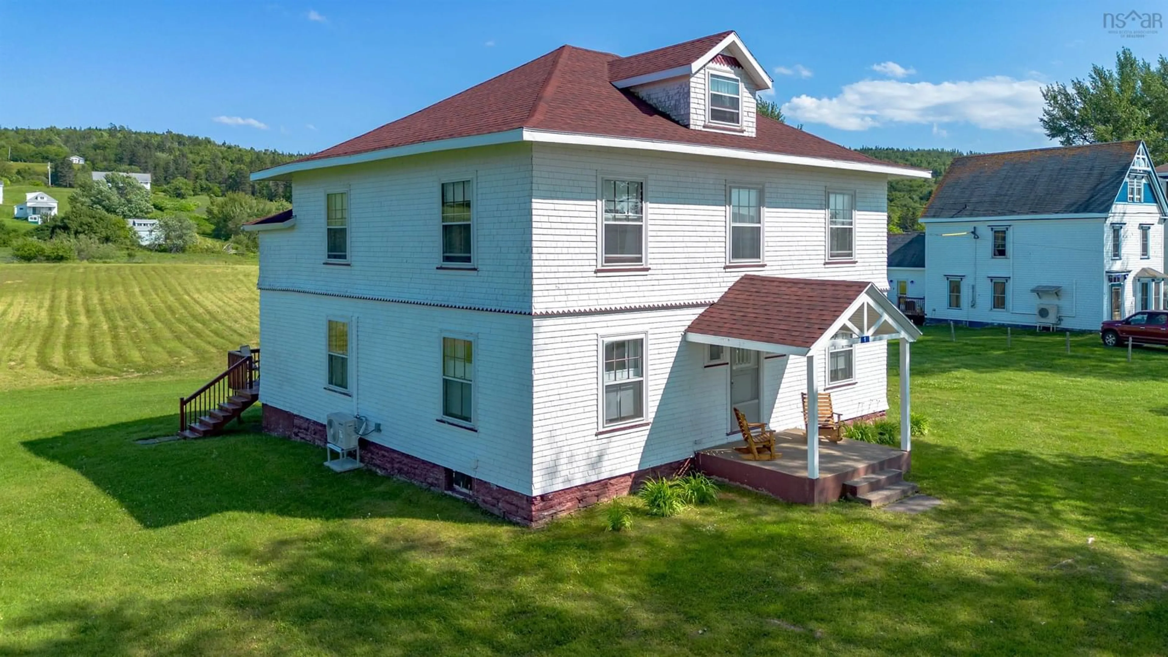 A pic from outside/outdoor area/front of a property/back of a property/a pic from drone, building for 1 Derby Point Rd, Grand Narrows Nova Scotia B1T 1E1