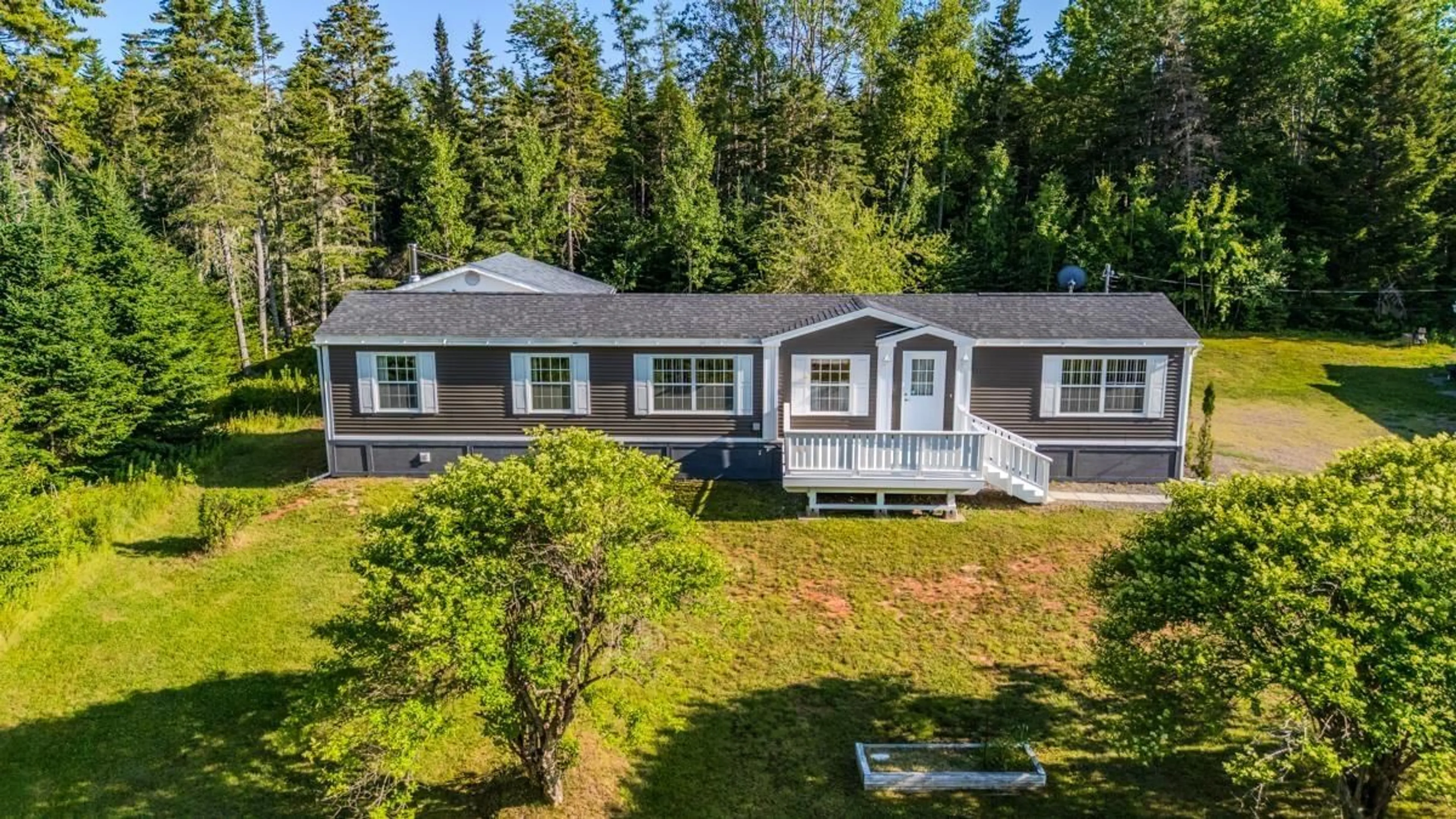 A pic from outside/outdoor area/front of a property/back of a property/a pic from drone, unknown for 5328 Hwy 2 Hwy, Bass River Nova Scotia B0M 1B0