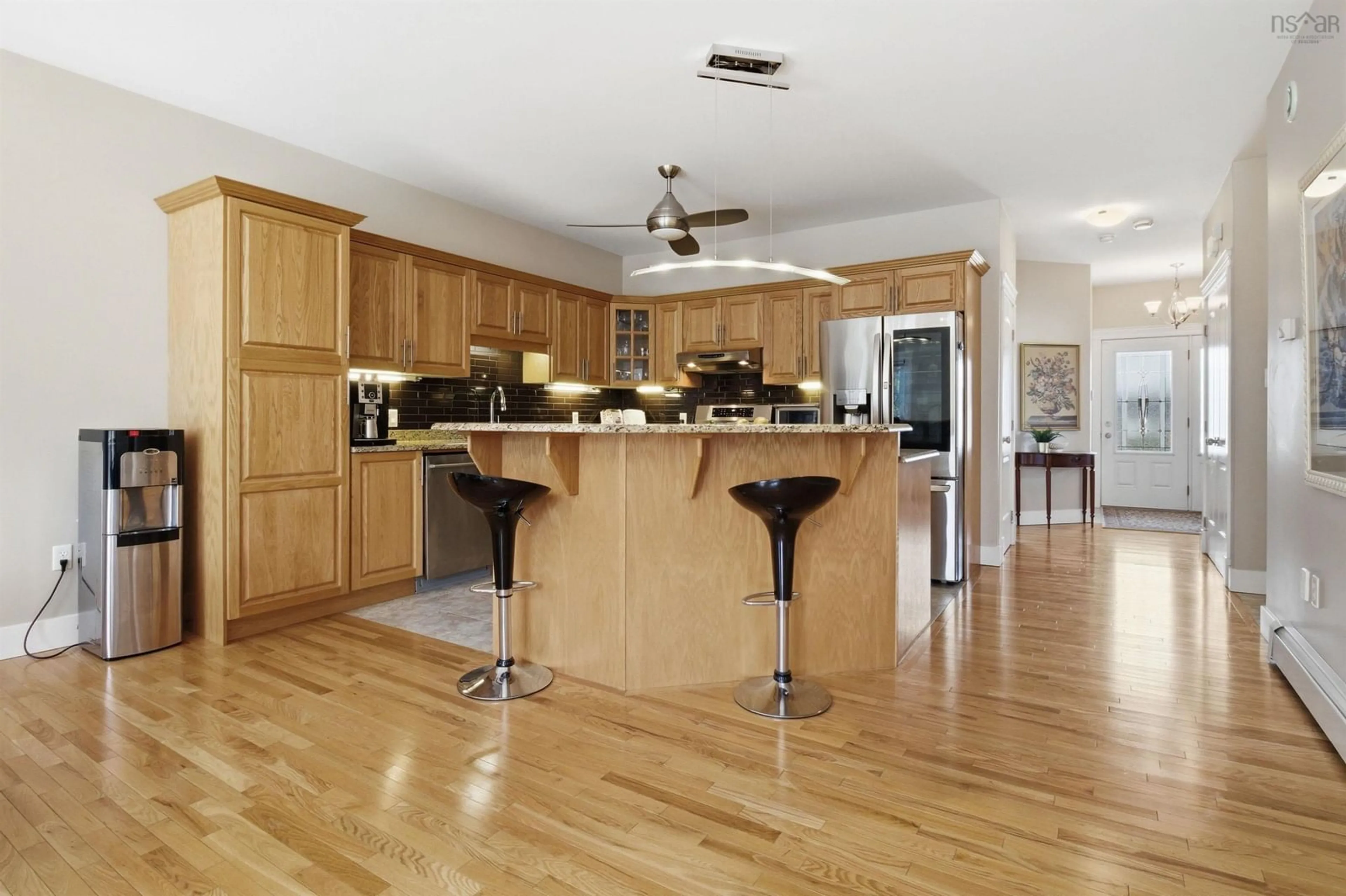 Open concept kitchen, wood/laminate floor for 42 Kirkwood Crt, Bedford South Nova Scotia B4A 0A8