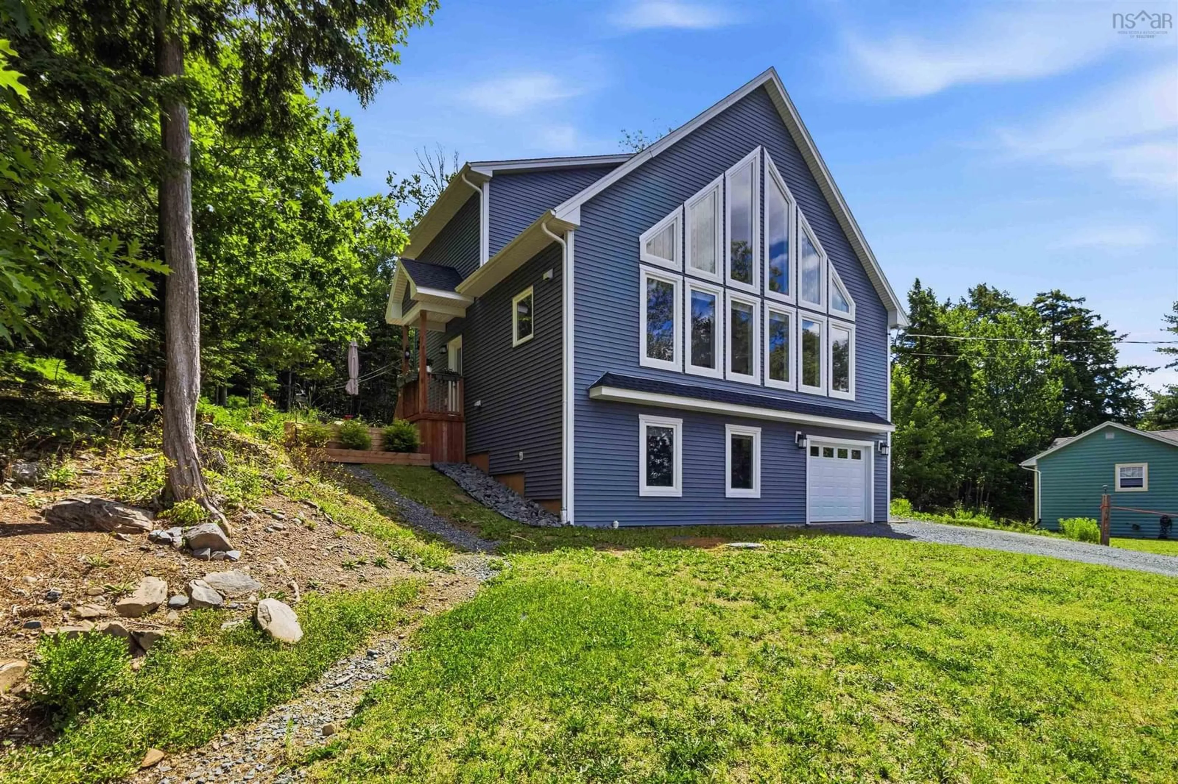 Home with vinyl exterior material, mountain view for 4040 Highway 2, Fletchers Lake Nova Scotia B2T 1A3