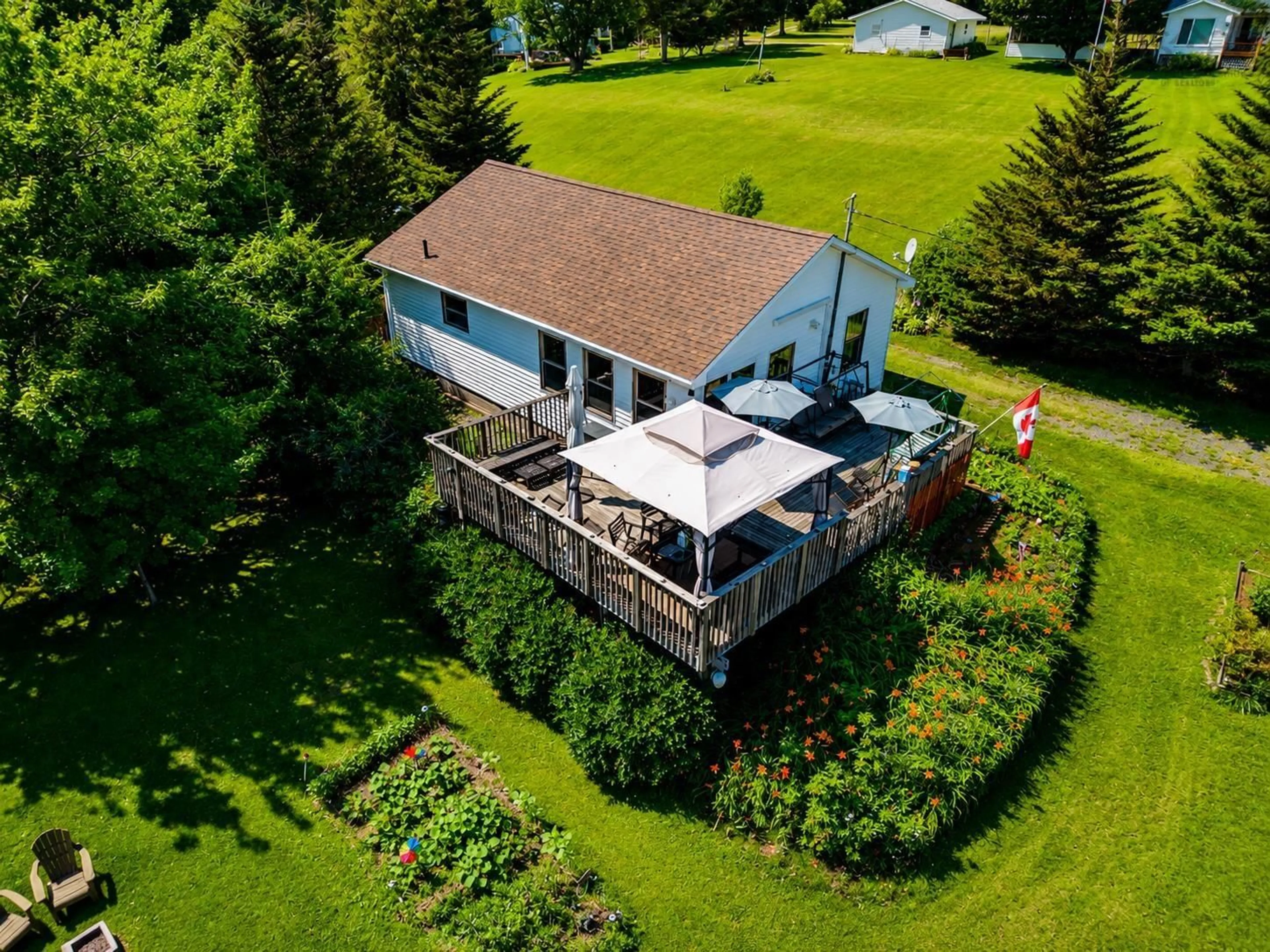 A pic from outside/outdoor area/front of a property/back of a property/a pic from drone, water/lake/river/ocean view for 36 Brownell Lane, Amherst Shore Nova Scotia B0L 1E0