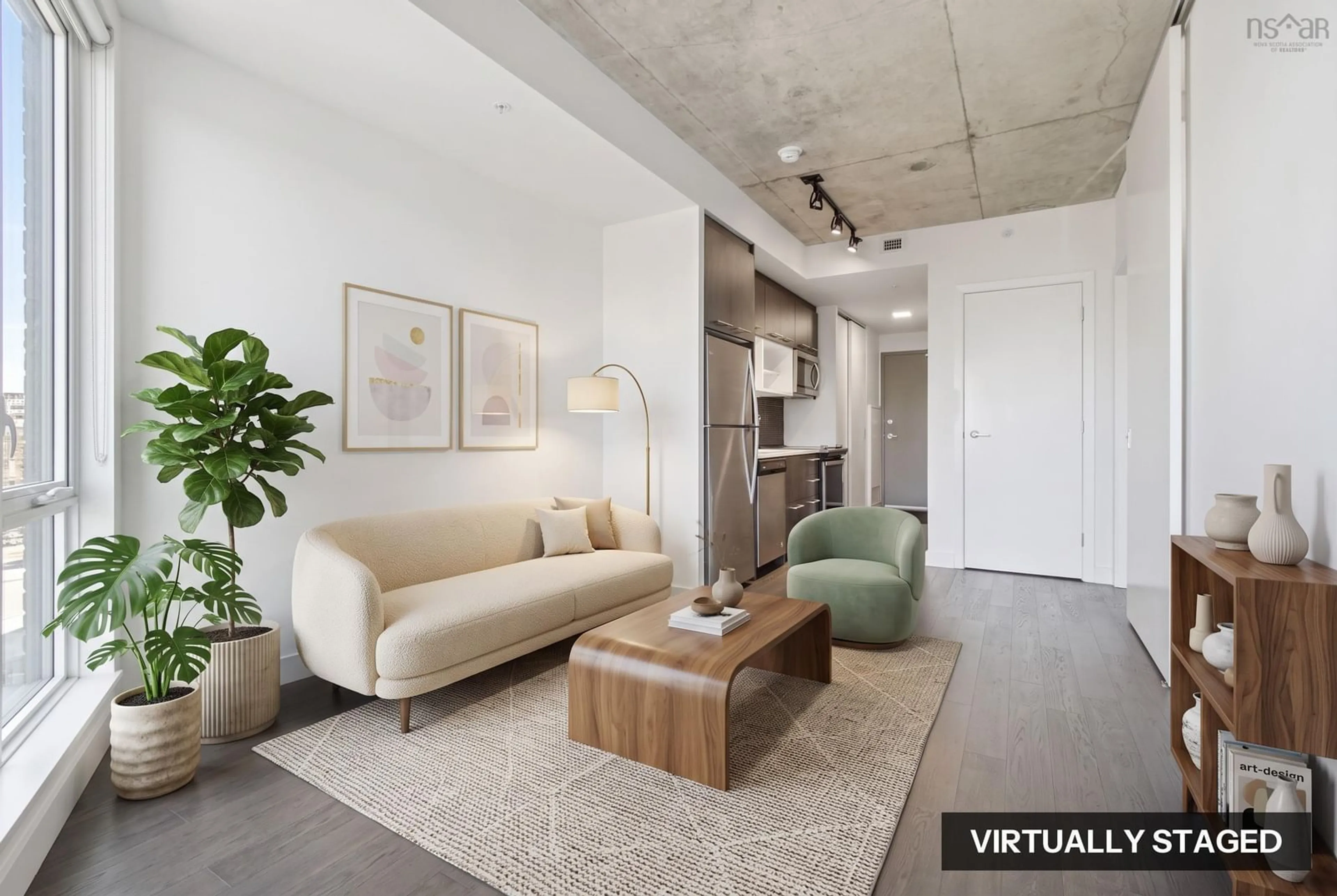 Living room with furniture, cement floor for 1048 Wellington St #508, Halifax Nova Scotia B3H 0C2