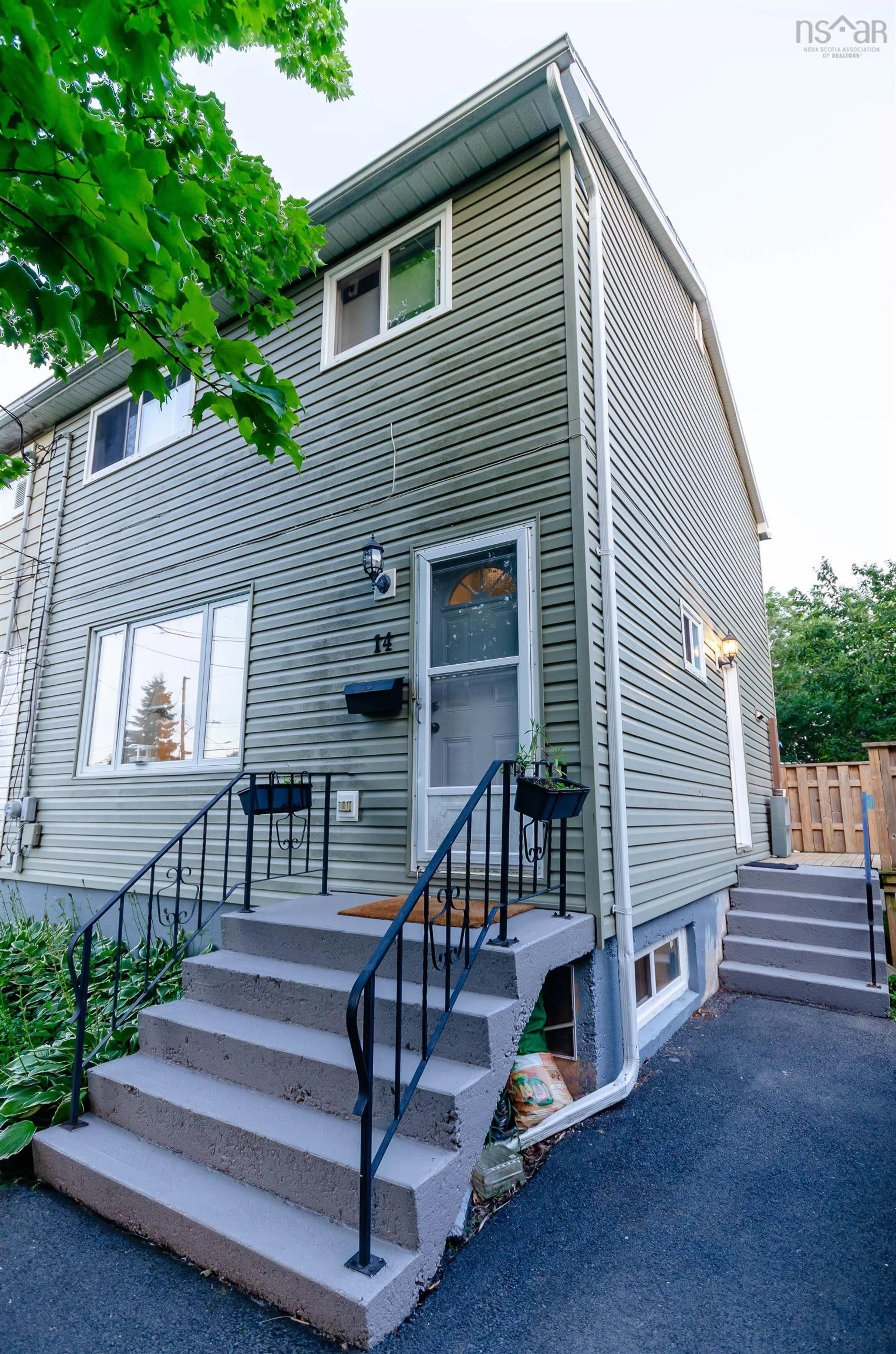 Home with vinyl exterior material, street for 14 Huntingdon Dr, Cole Harbour Nova Scotia B2V 1W1