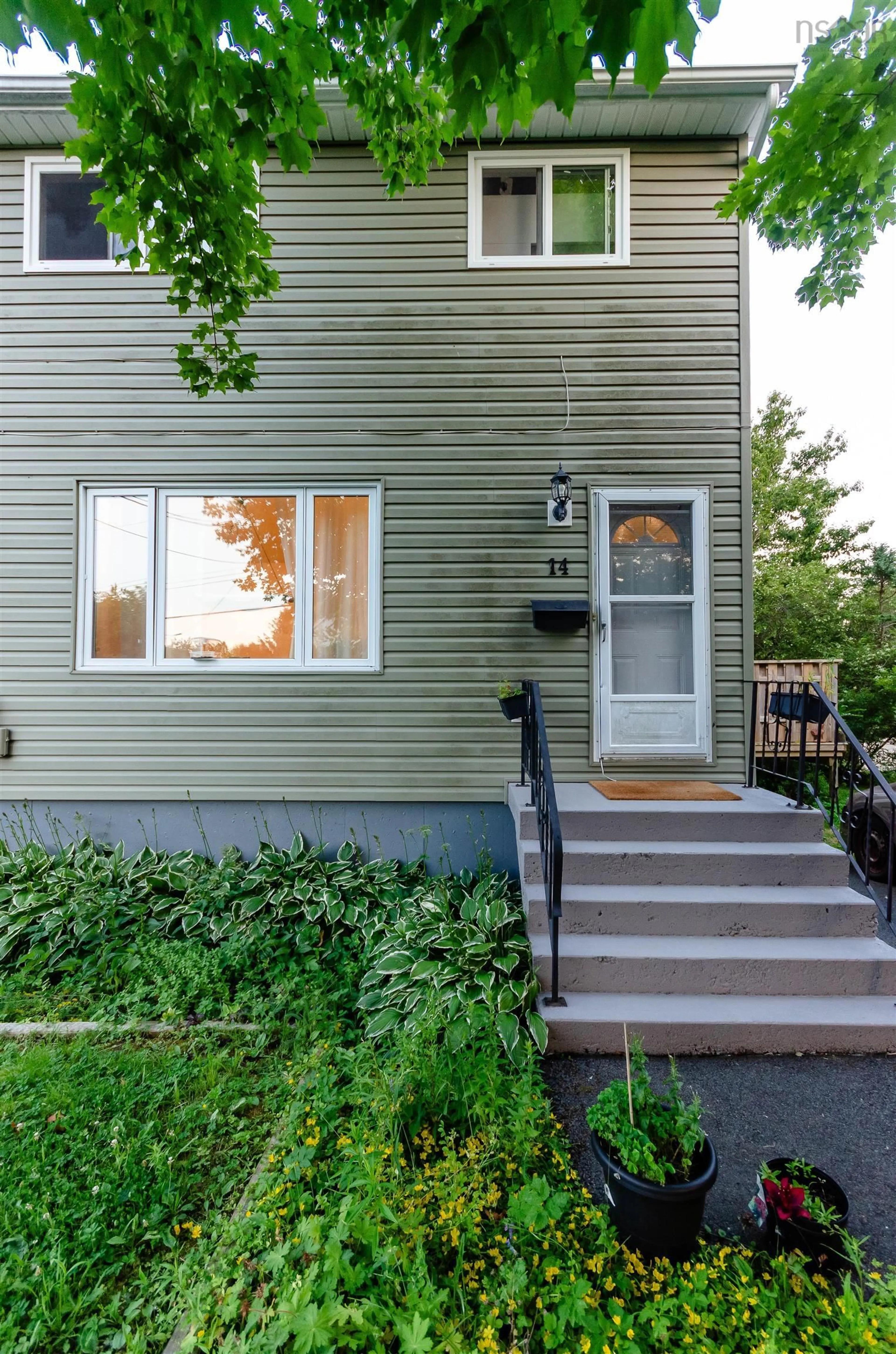 Home with vinyl exterior material, street for 14 Huntingdon Dr, Cole Harbour Nova Scotia B2V 1W1
