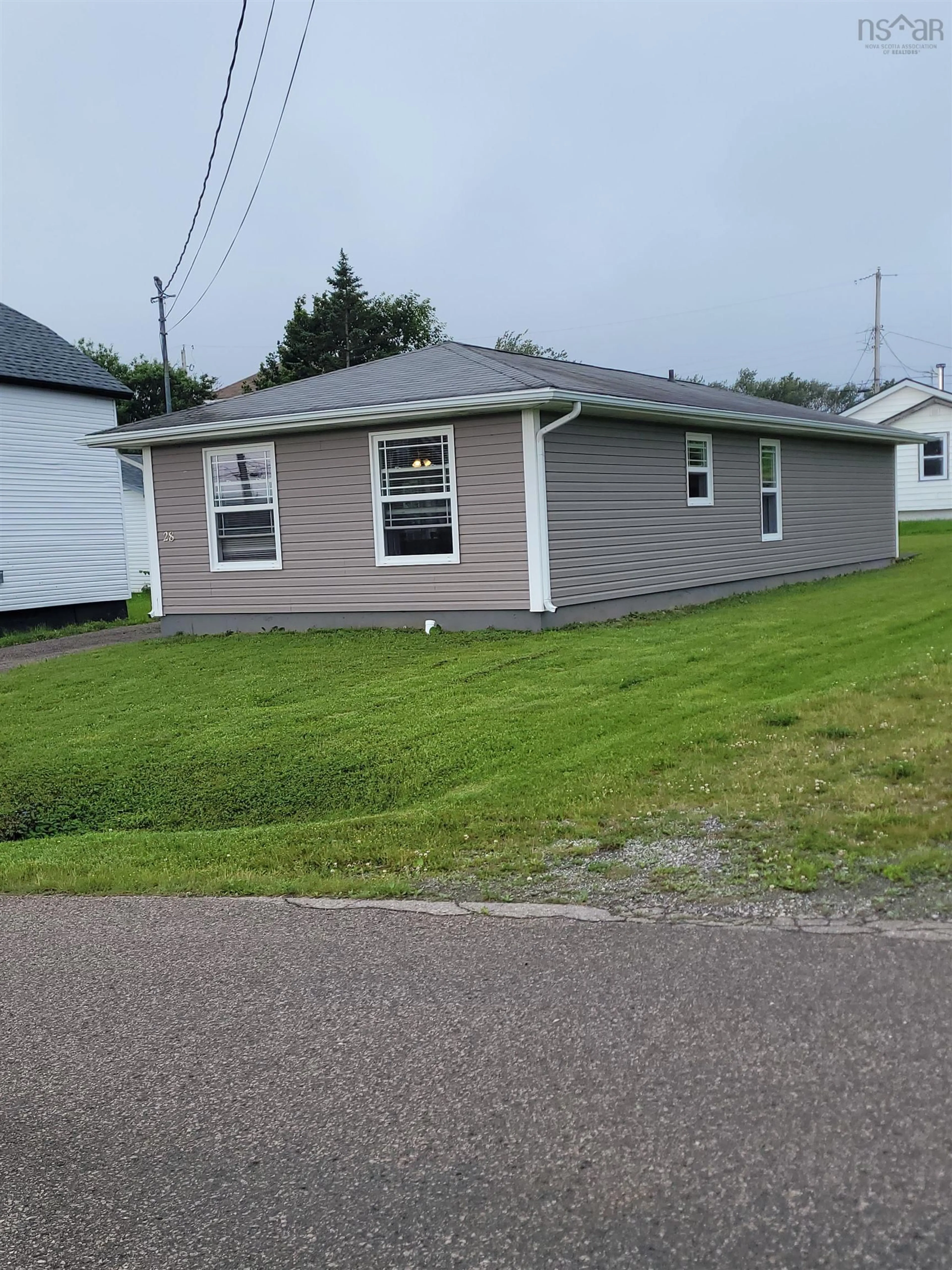 Home with vinyl exterior material, street for 28 Pleasant St, Glace Bay Nova Scotia B1A 3Z9