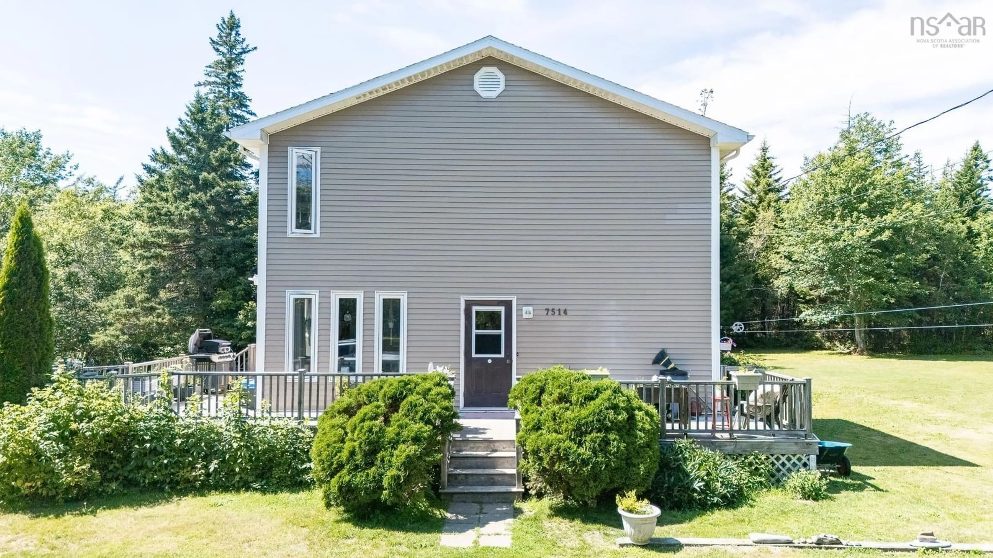 Home with vinyl exterior material, building for 7514 Highway 3, Ste. Anne Du Ruisseau Nova Scotia B0W 2X0