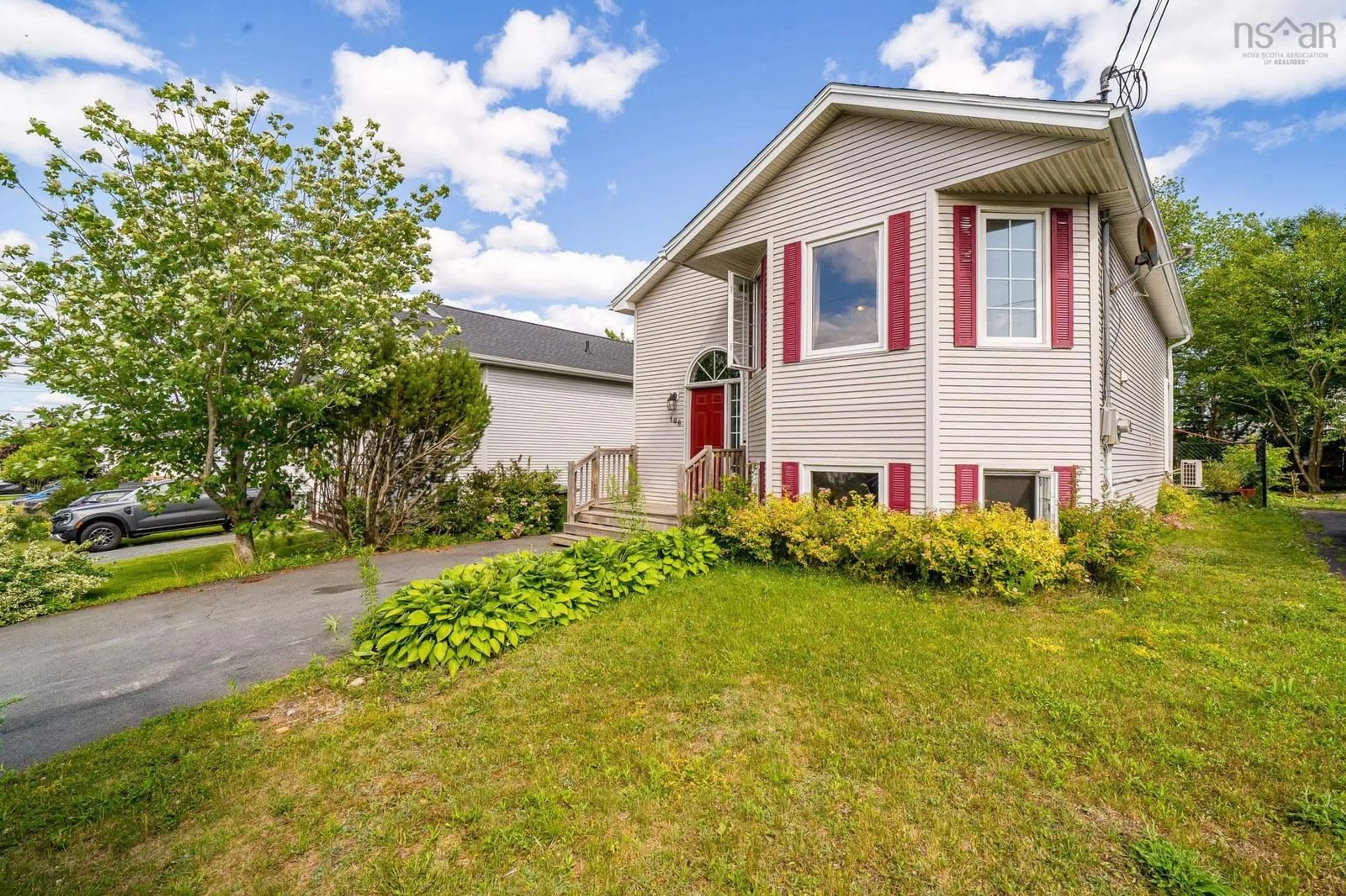 Home with vinyl exterior material, street for 106 Jeep Cres, Eastern Passage Nova Scotia B3G 1P3