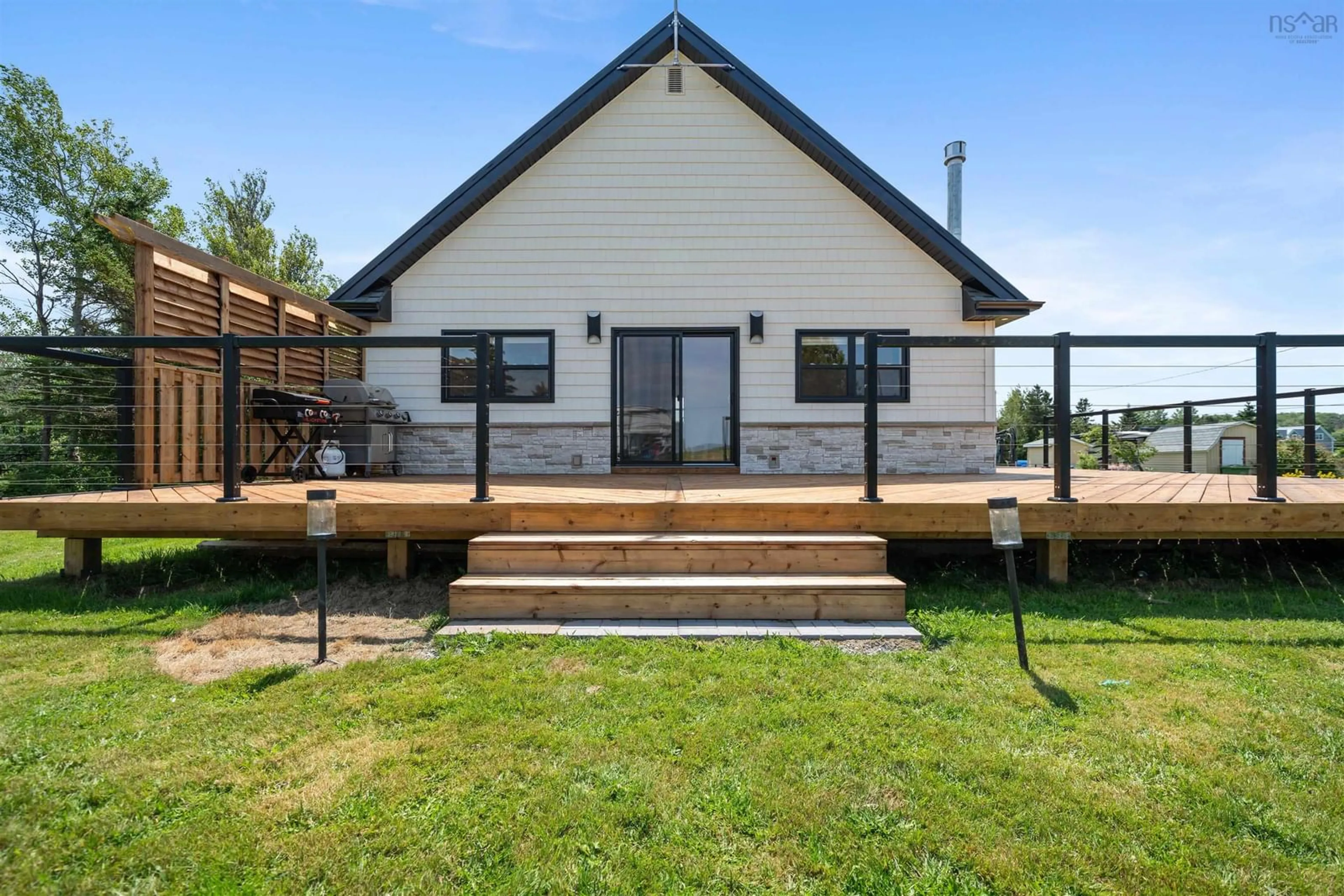 A pic from outside/outdoor area/front of a property/back of a property/a pic from drone, unknown for 37 Reid Dr, Gulf Shore Nova Scotia B0K 1L0