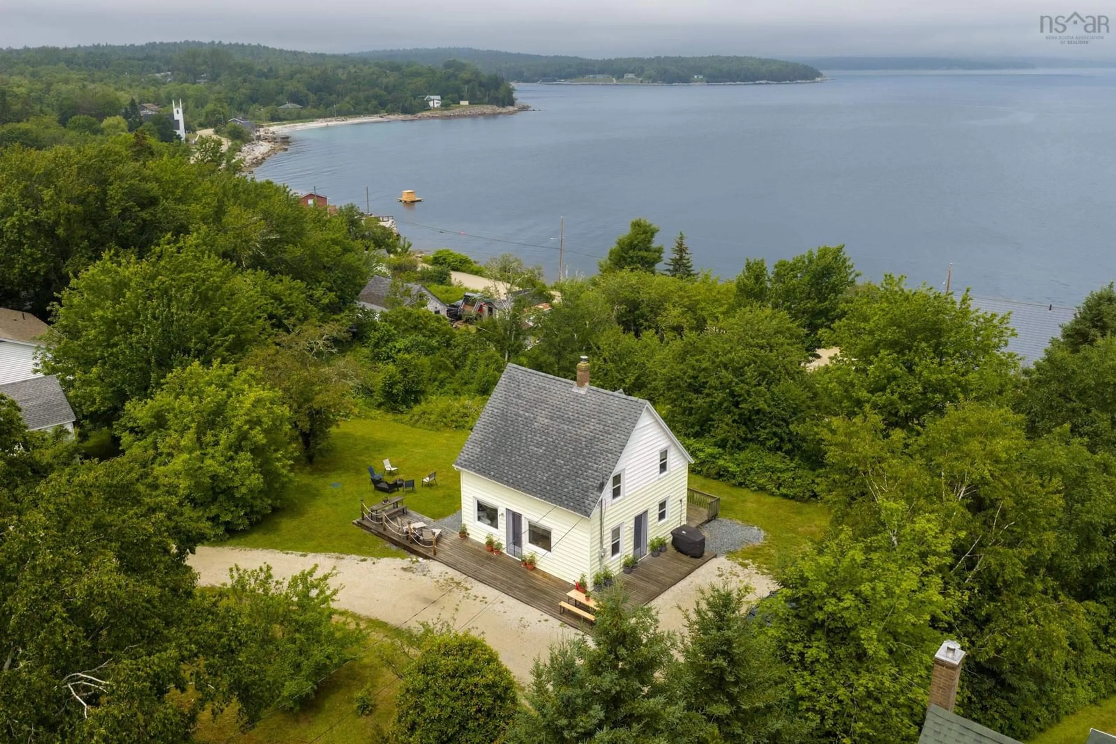 A pic from outside/outdoor area/front of a property/back of a property/a pic from drone, water/lake/river/ocean view for 1275 Highway 329, Mill Cove Nova Scotia B0J 1T0
