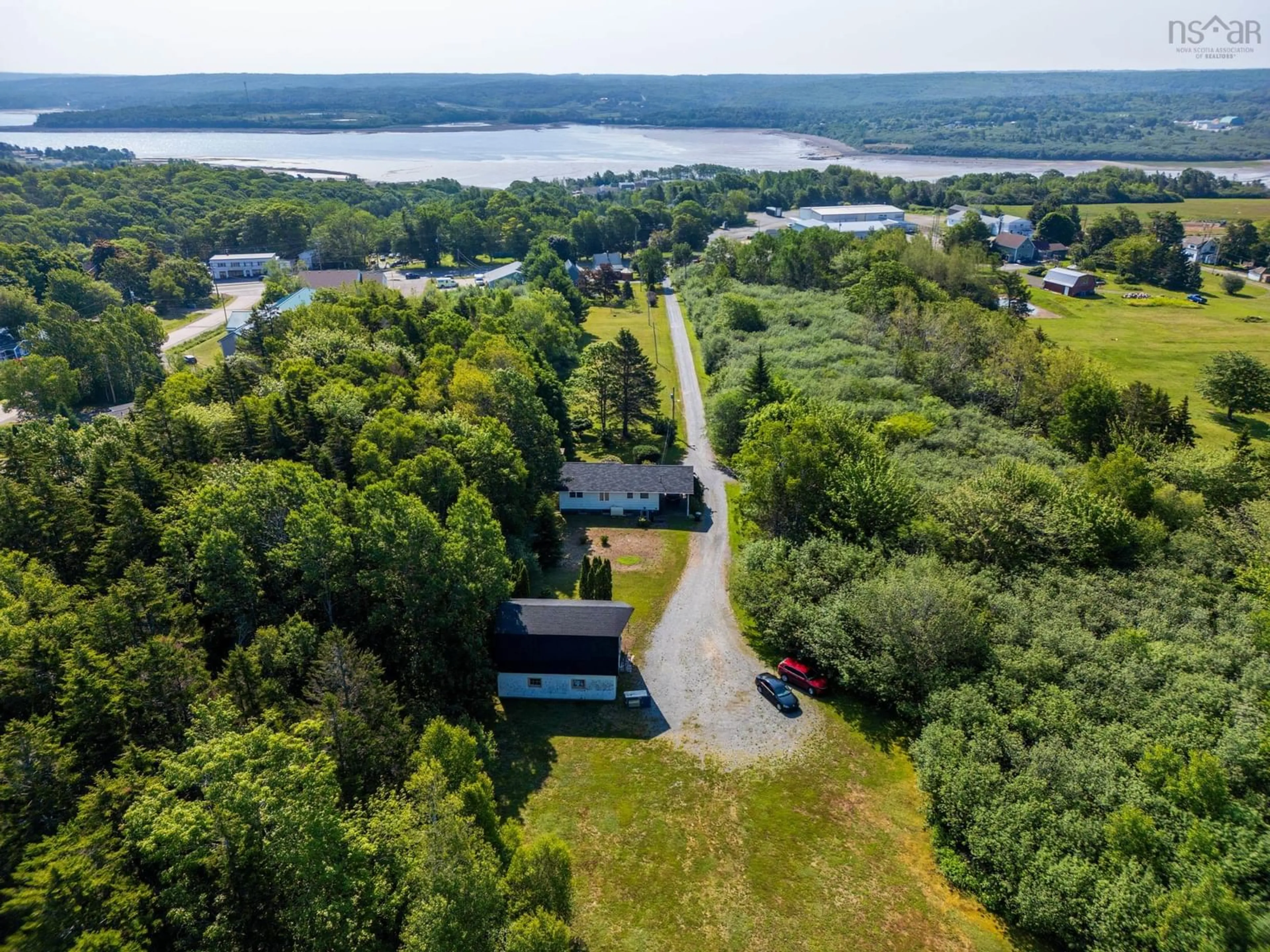 A pic from outside/outdoor area/front of a property/back of a property/a pic from drone, water/lake/river/ocean view for 190 Highway 303, Conway Nova Scotia B0V 1A0