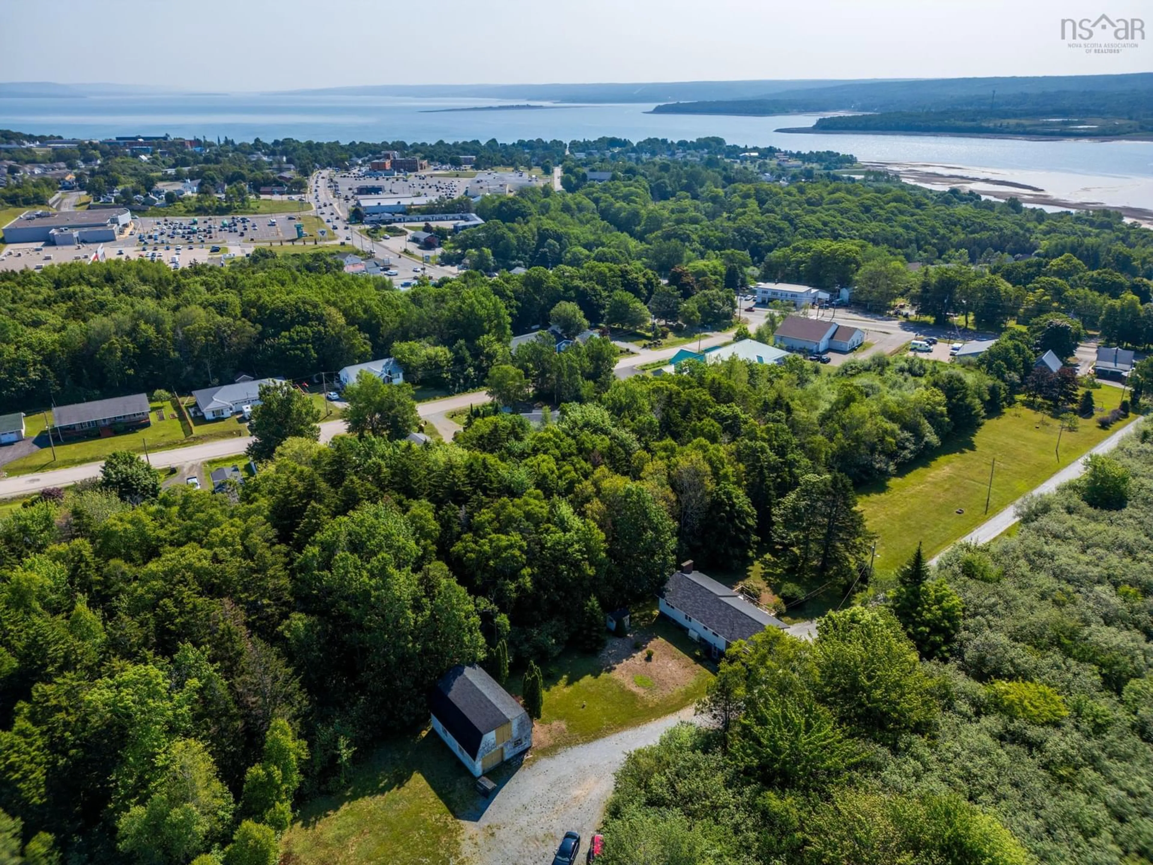 A pic from outside/outdoor area/front of a property/back of a property/a pic from drone, water/lake/river/ocean view for 190 Highway 303, Conway Nova Scotia B0V 1A0