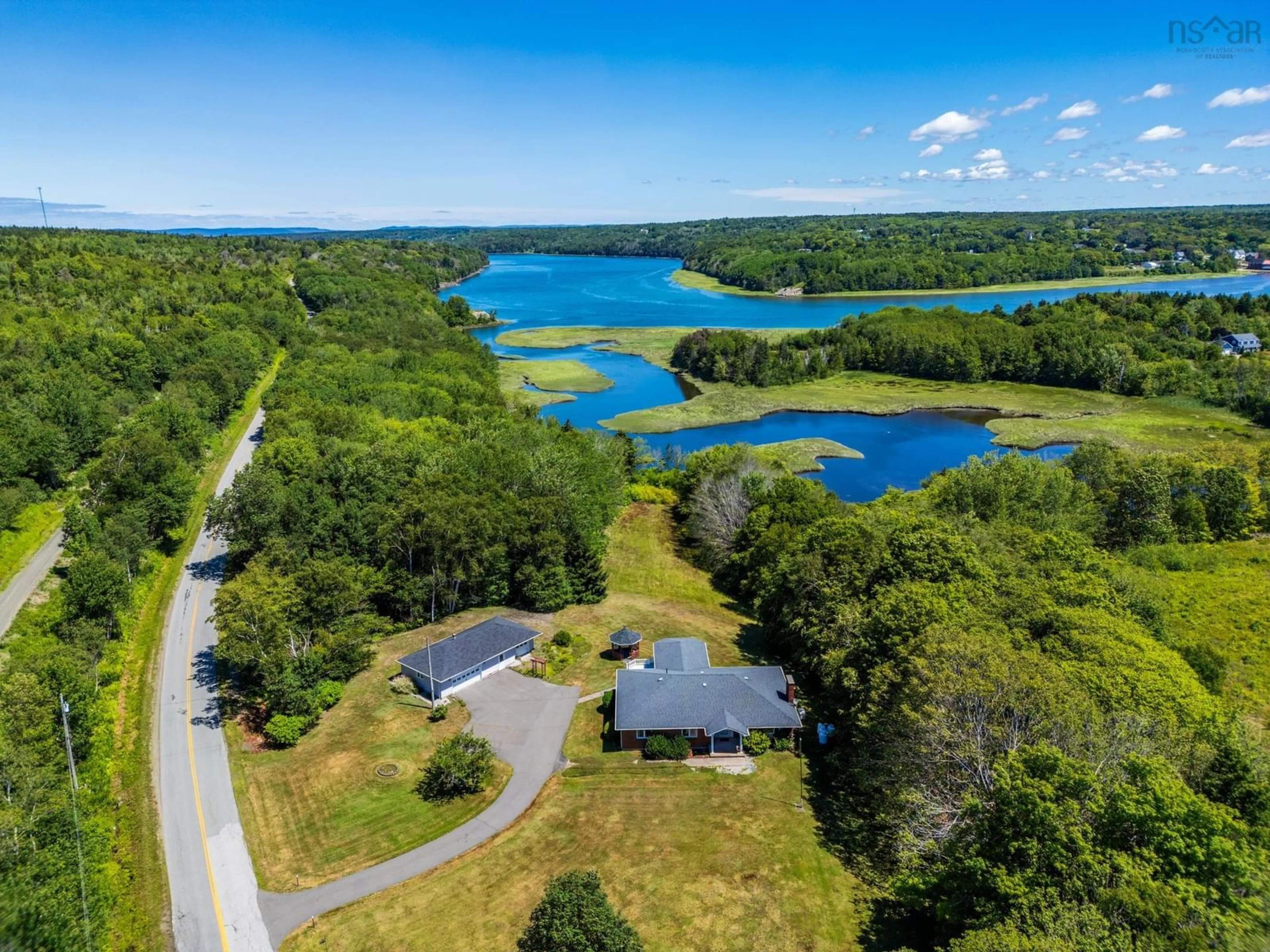 A pic from outside/outdoor area/front of a property/back of a property/a pic from drone, water/lake/river/ocean view for 1729 Riverside Road, St. Bernard Nova Scotia B0W 3T0