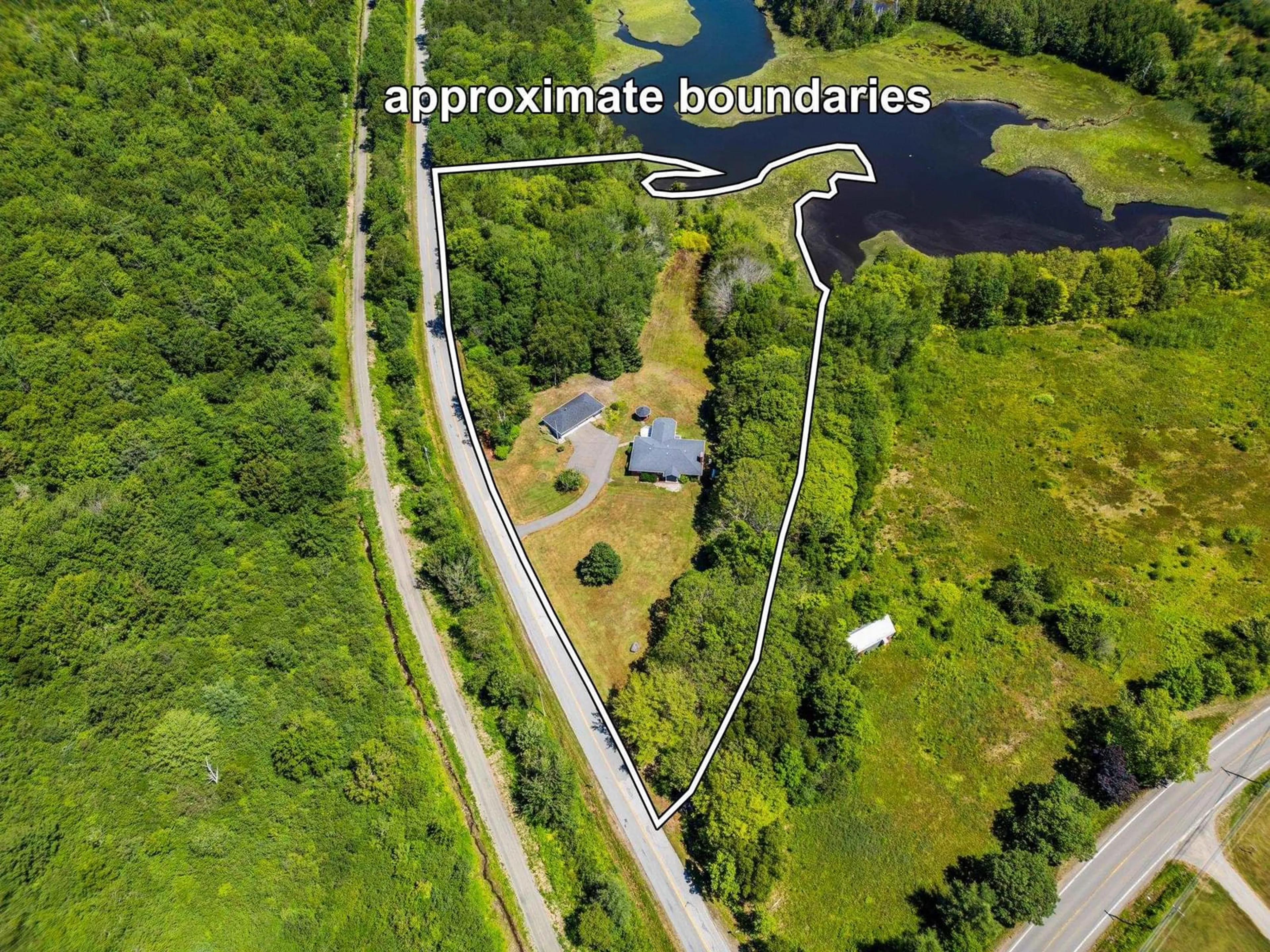 A pic from outside/outdoor area/front of a property/back of a property/a pic from drone, water/lake/river/ocean view for 1729 Riverside Road, St. Bernard Nova Scotia B0W 3T0
