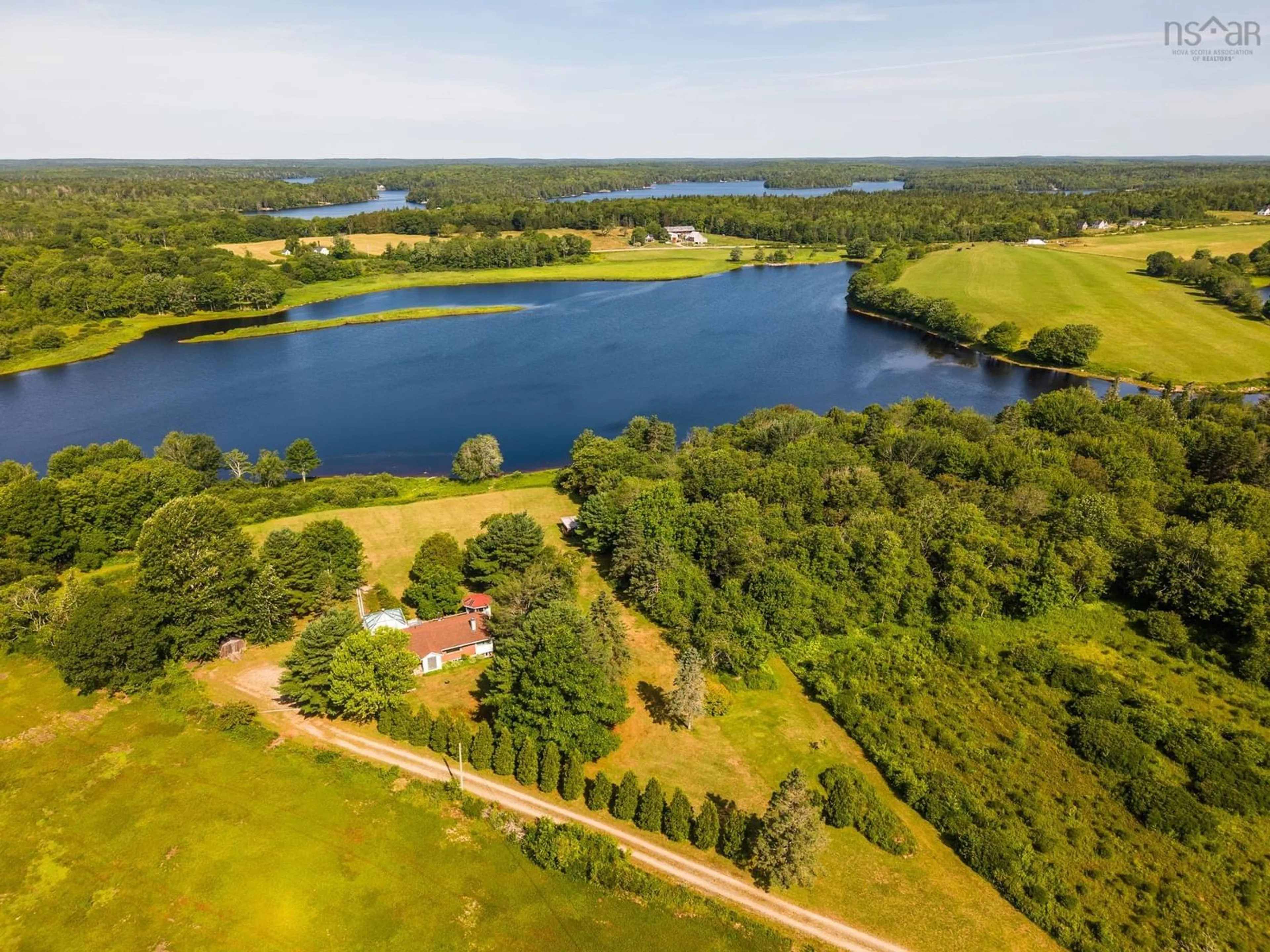 A pic from outside/outdoor area/front of a property/back of a property/a pic from drone, water/lake/river/ocean view for 2357 Highway 203 East Kemptville, East Kemptville Nova Scotia B5A 5P5