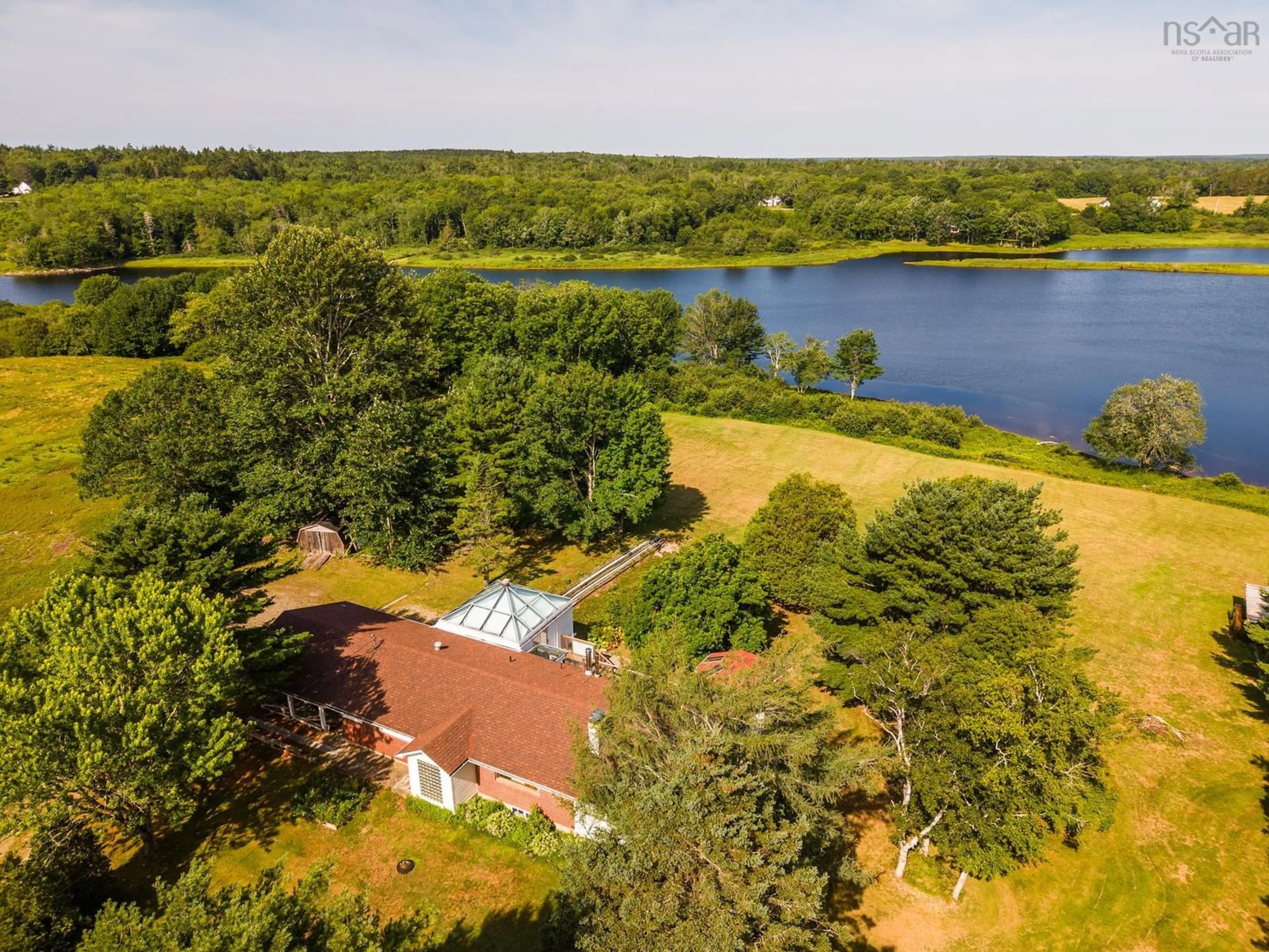 A pic from outside/outdoor area/front of a property/back of a property/a pic from drone, water/lake/river/ocean view for 2357 Highway 203 East Kemptville, East Kemptville Nova Scotia B5A 5P5