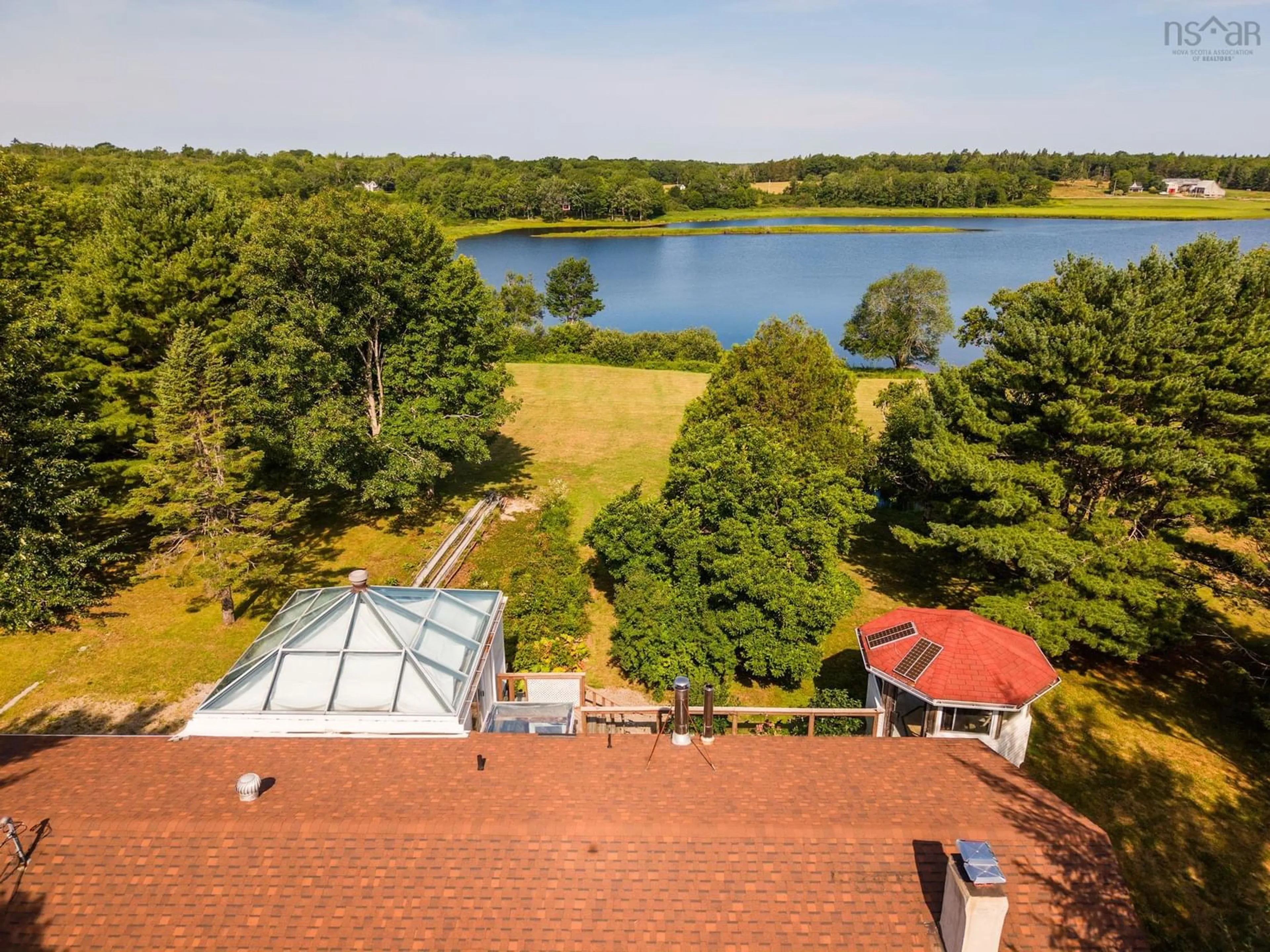 A pic from outside/outdoor area/front of a property/back of a property/a pic from drone, water/lake/river/ocean view for 2357 Highway 203 East Kemptville, East Kemptville Nova Scotia B5A 5P5