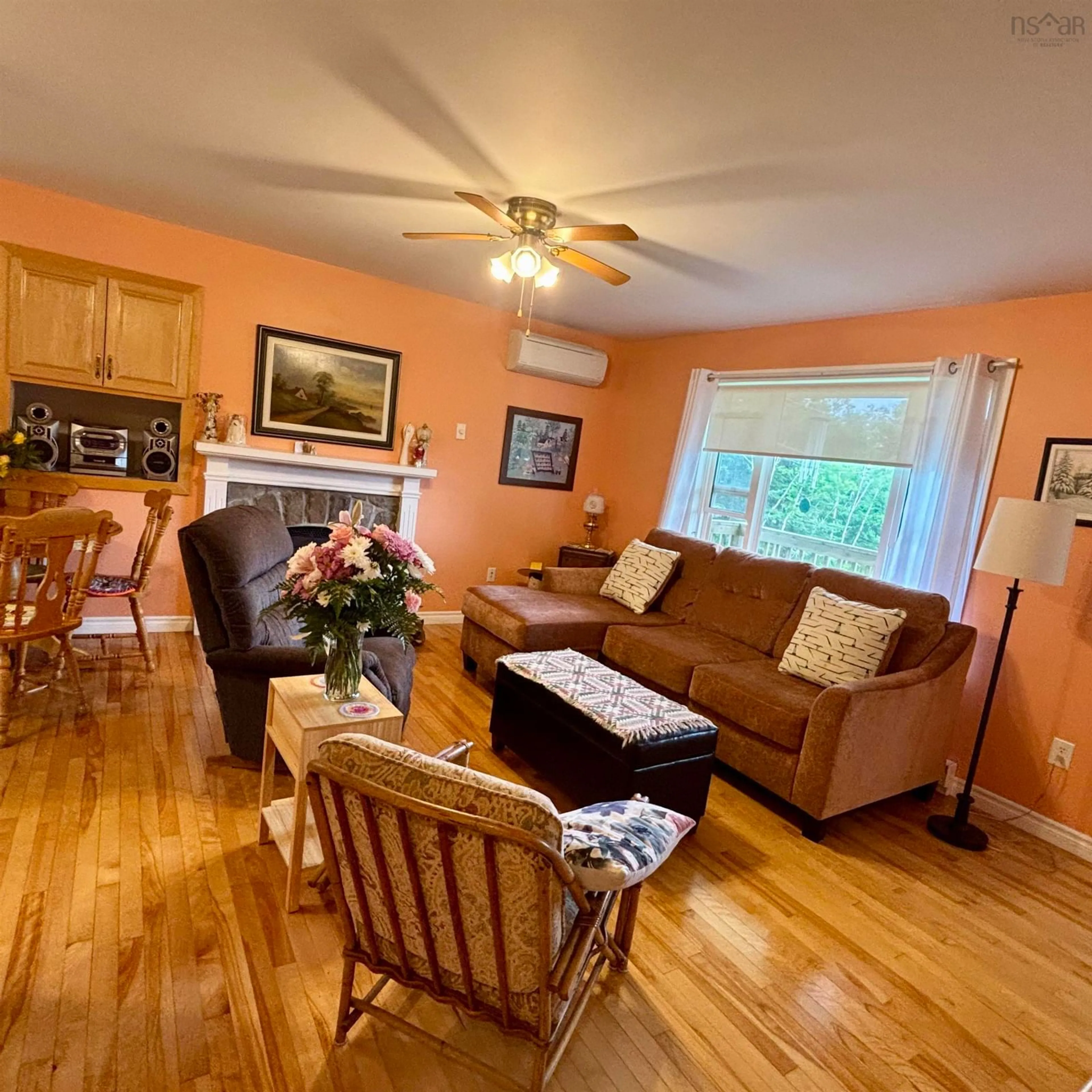 Living room with furniture, wood/laminate floor for 1619 Gabarus Hwy, Prime Brook Nova Scotia B1L 1E8