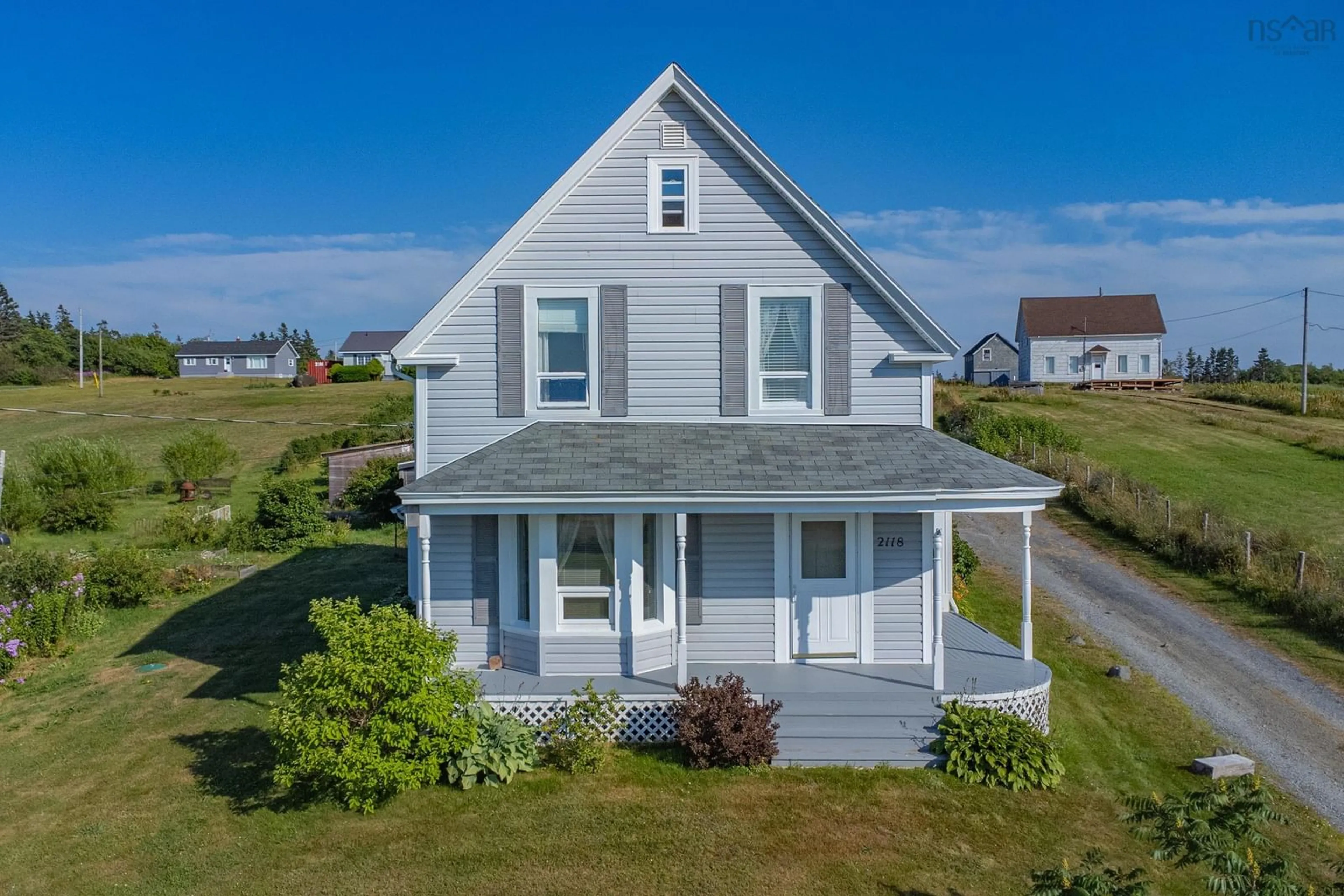 A pic from outside/outdoor area/front of a property/back of a property/a pic from drone, unknown for 2118 Highway 1, Grosses Coques Nova Scotia B0W 1M0