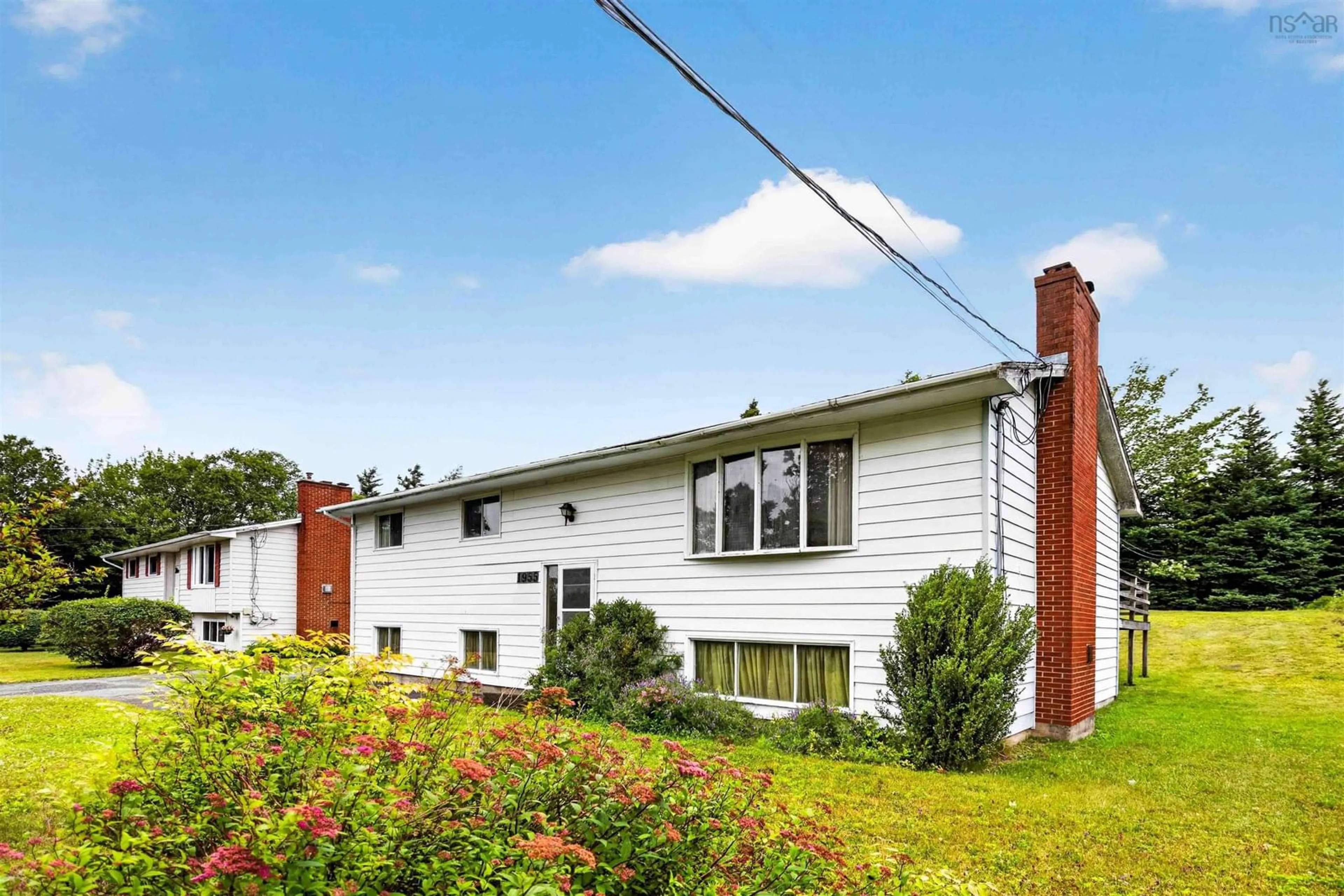 Home with vinyl exterior material, street for 1955 Lawrencetown Rd, Lawrencetown Nova Scotia B2Z 1C5