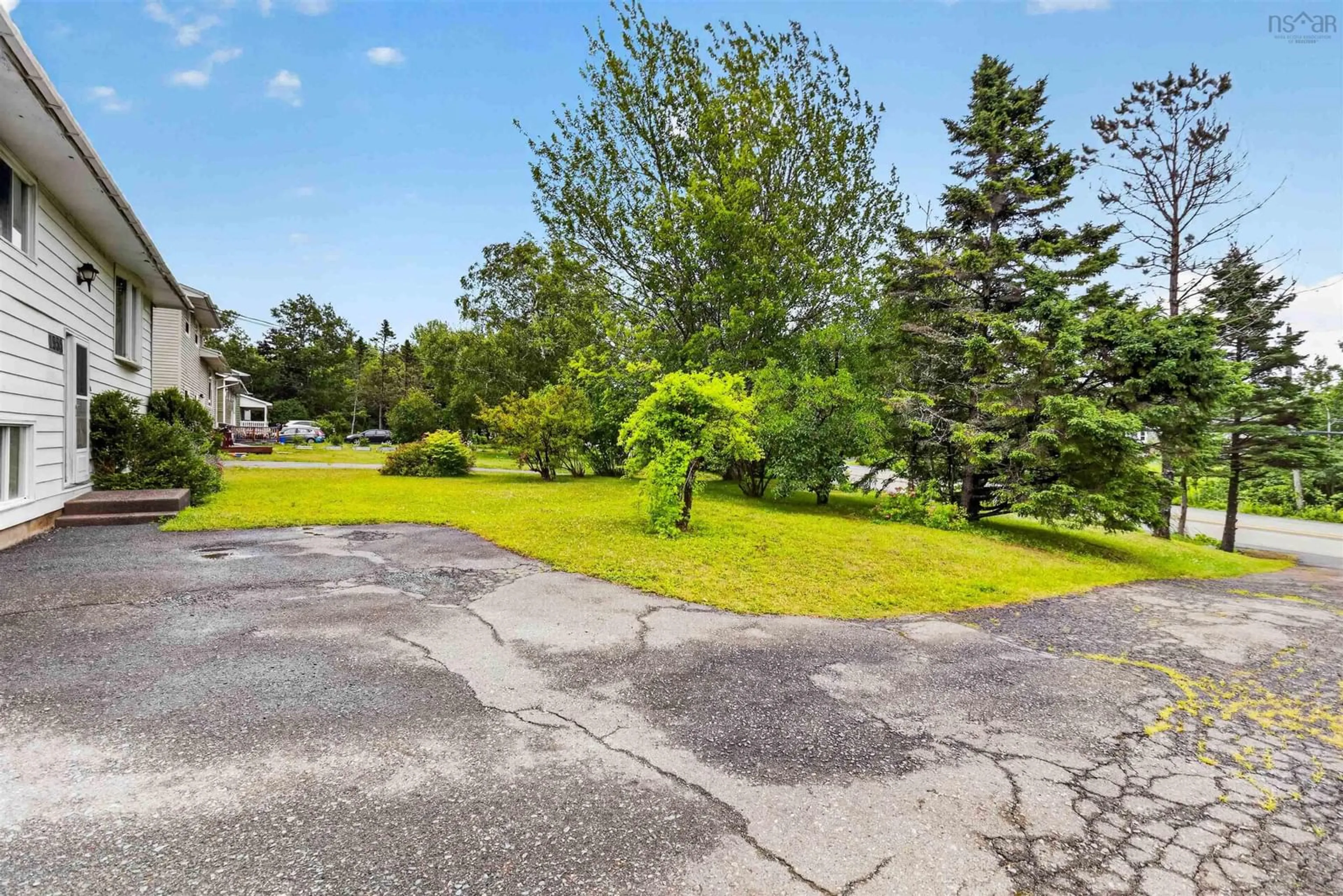 A pic from outside/outdoor area/front of a property/back of a property/a pic from drone, water/lake/river/ocean view for 1955 Lawrencetown Rd, Lawrencetown Nova Scotia B2Z 1C5
