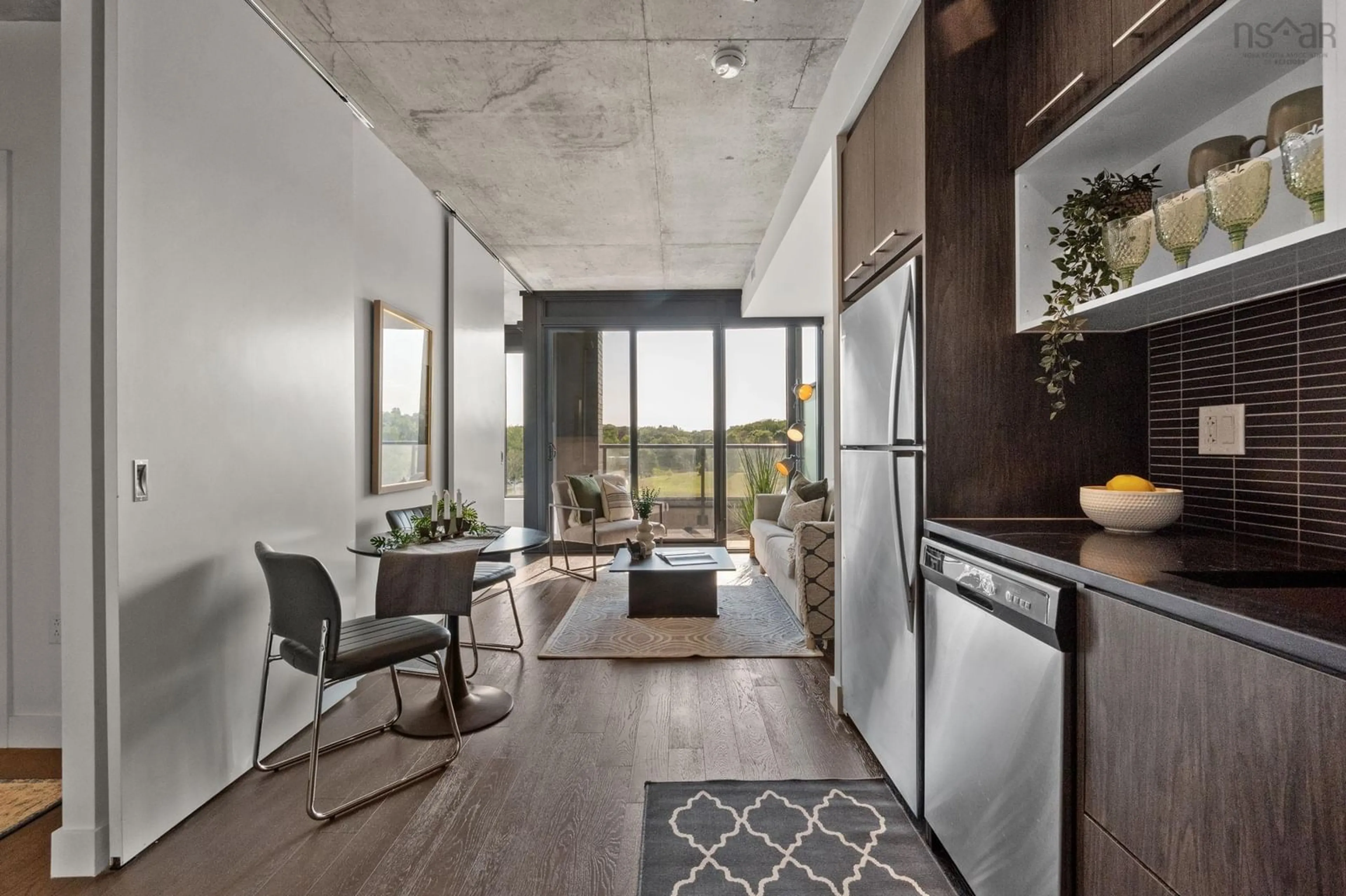 Open concept kitchen, cement floor for 1048 Wellington #503, Halifax Nova Scotia B3H 2Z8