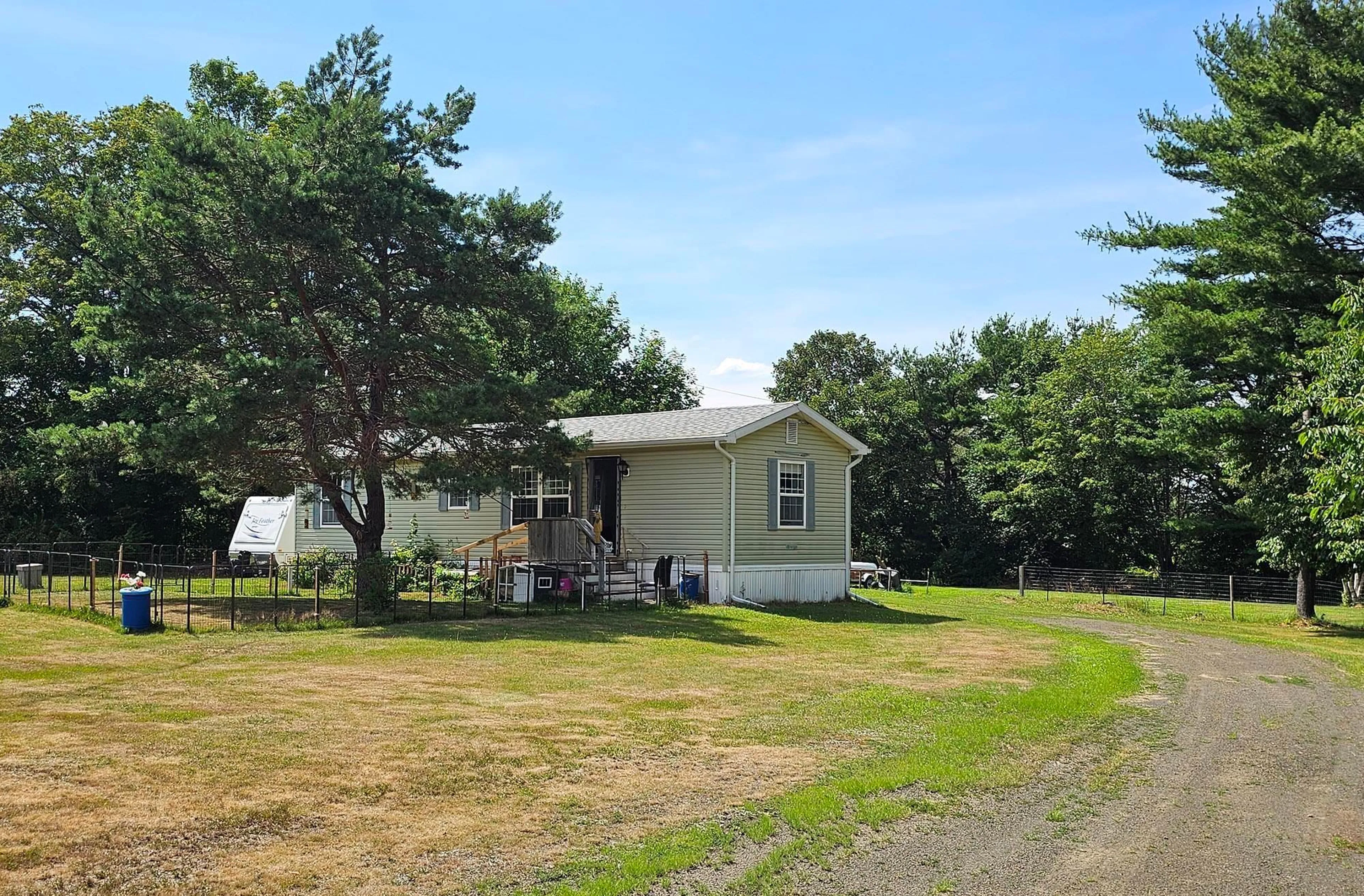 A pic from outside/outdoor area/front of a property/back of a property/a pic from drone, unknown for 1781 Highway 201, Round Hill Nova Scotia B0S 1A0