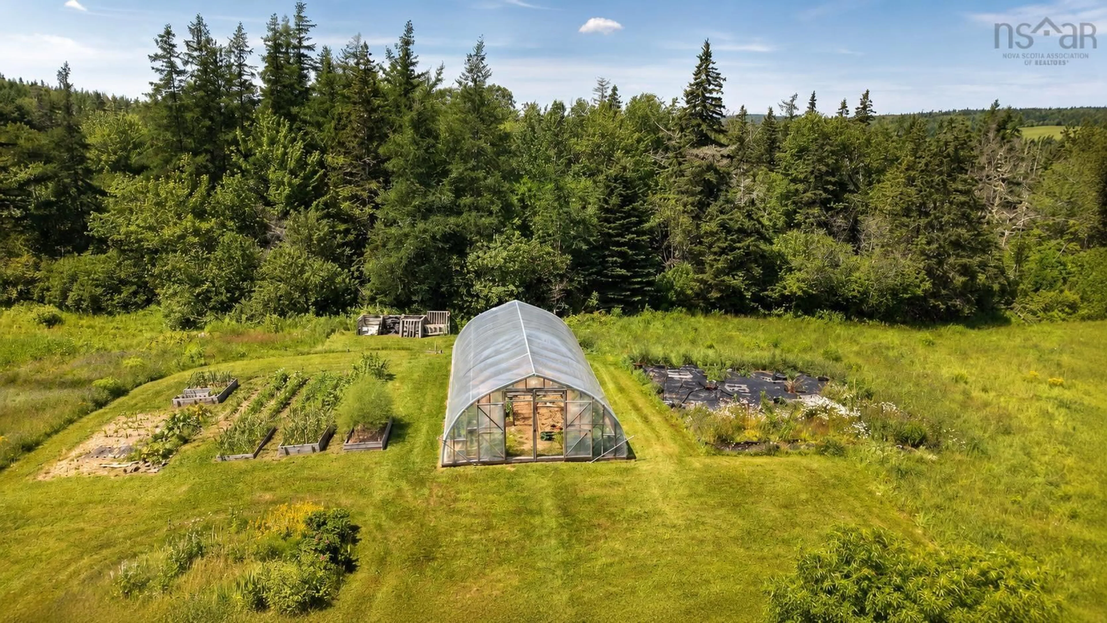 A pic from outside/outdoor area/front of a property/back of a property/a pic from drone, forest/trees view for 2606 Highway 252, Nevada Valley Nova Scotia B0E 3M0