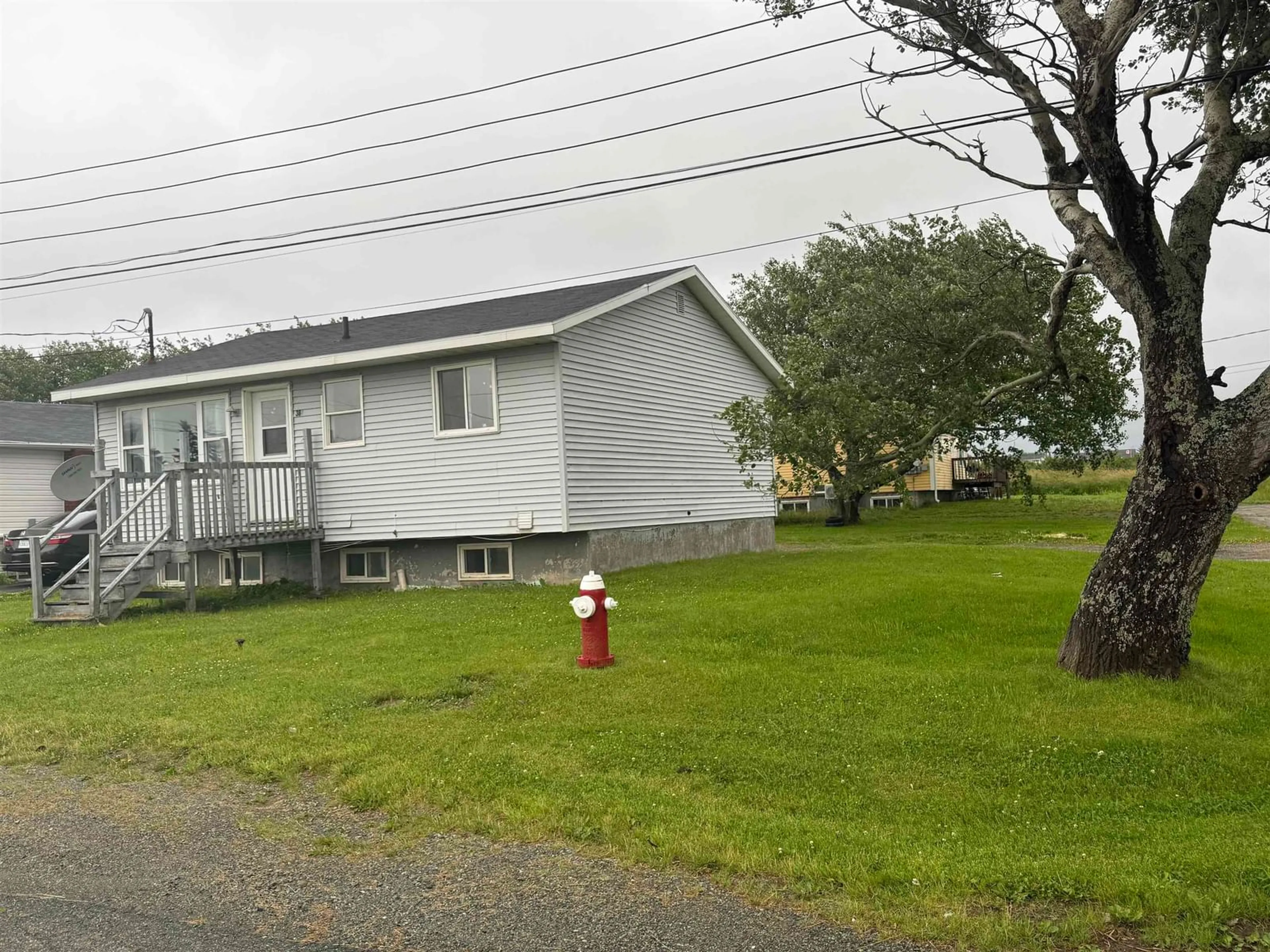 A pic from outside/outdoor area/front of a property/back of a property/a pic from drone, street for 384 Fourteenth St, New Waterford Nova Scotia B1H 4V8
